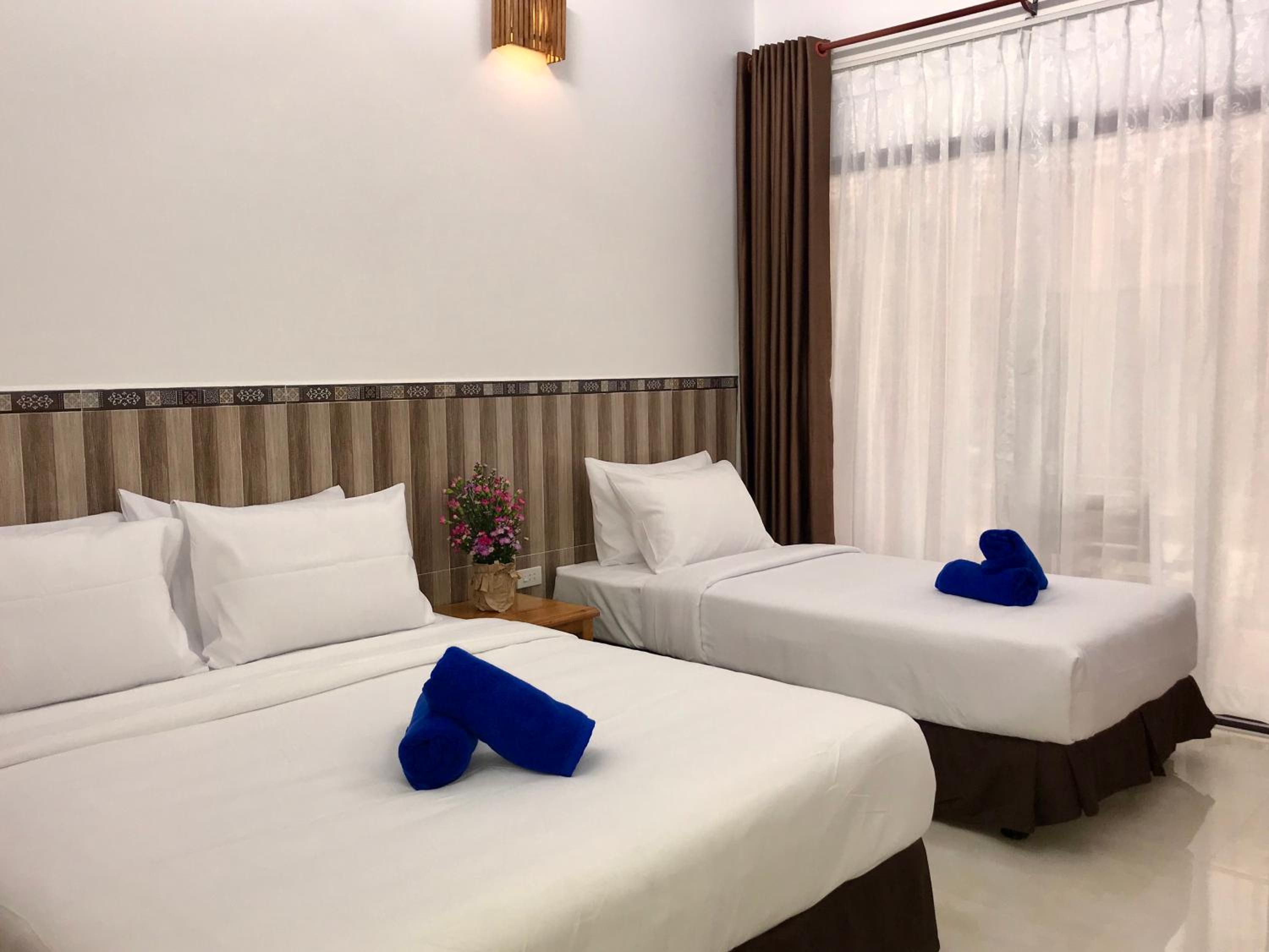 Triple Room with Garden View - Photo 1