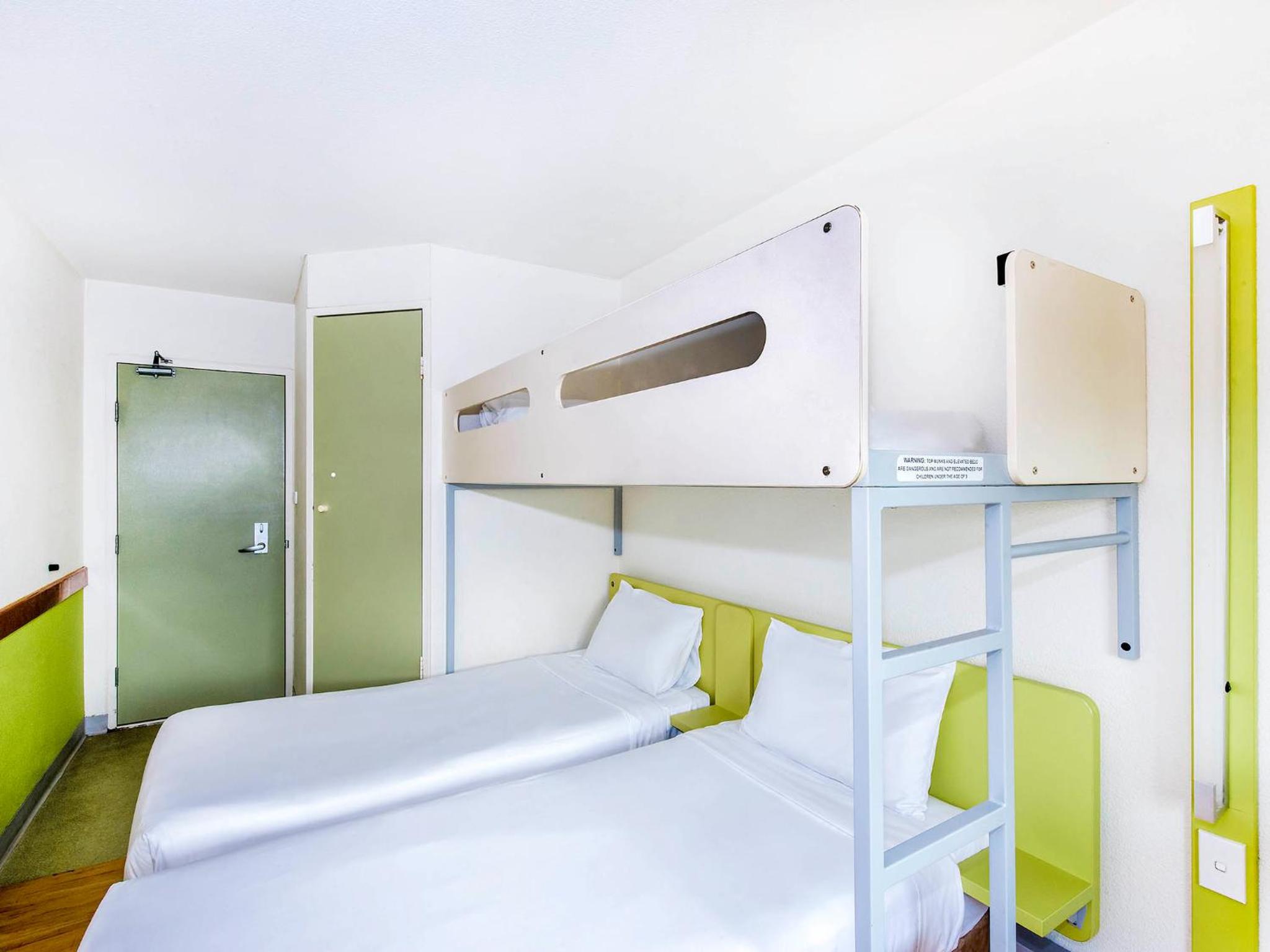 Standard Room with Two Single King Beds and Overhead Bunk photo 3