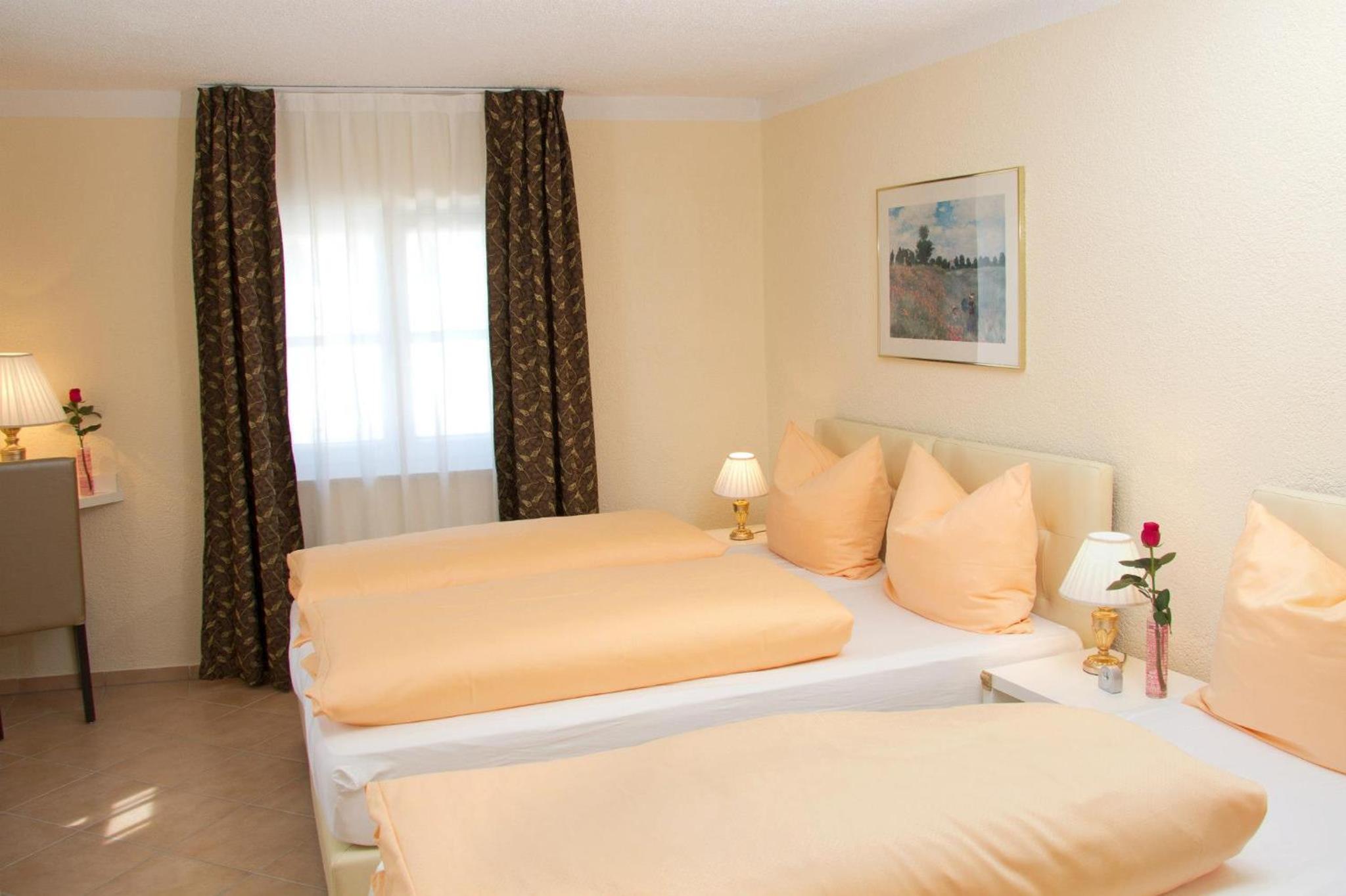 Triple Room - Photo 1