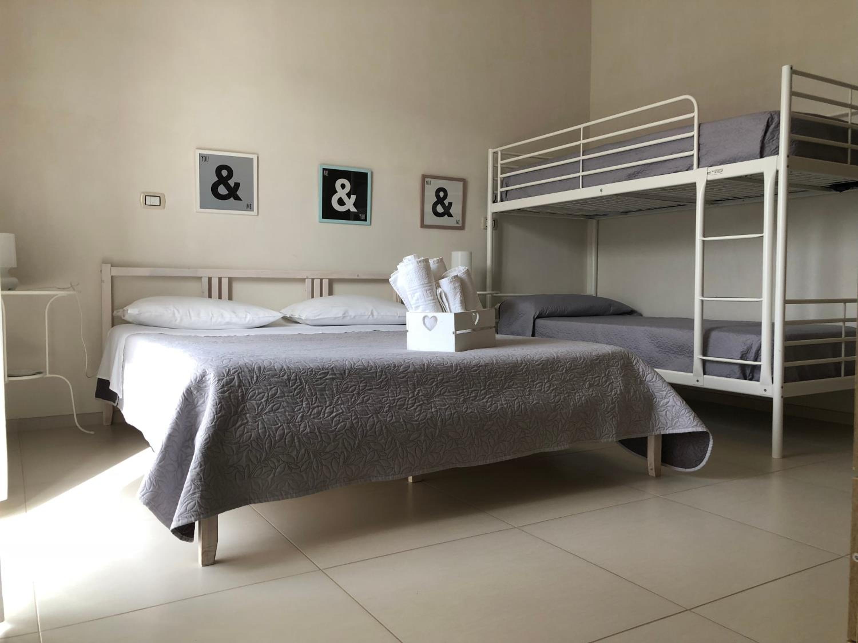 Quadruple Room with Balcony - Photo 1