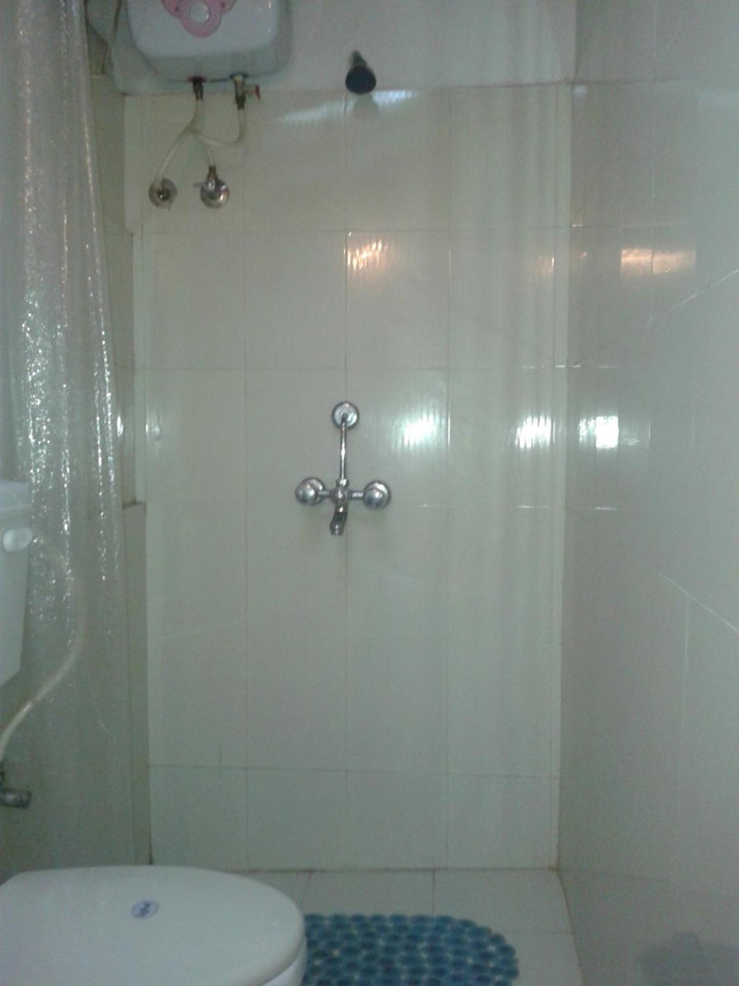 Deluxe Double Room with Shower (Non AC) - Photo 17