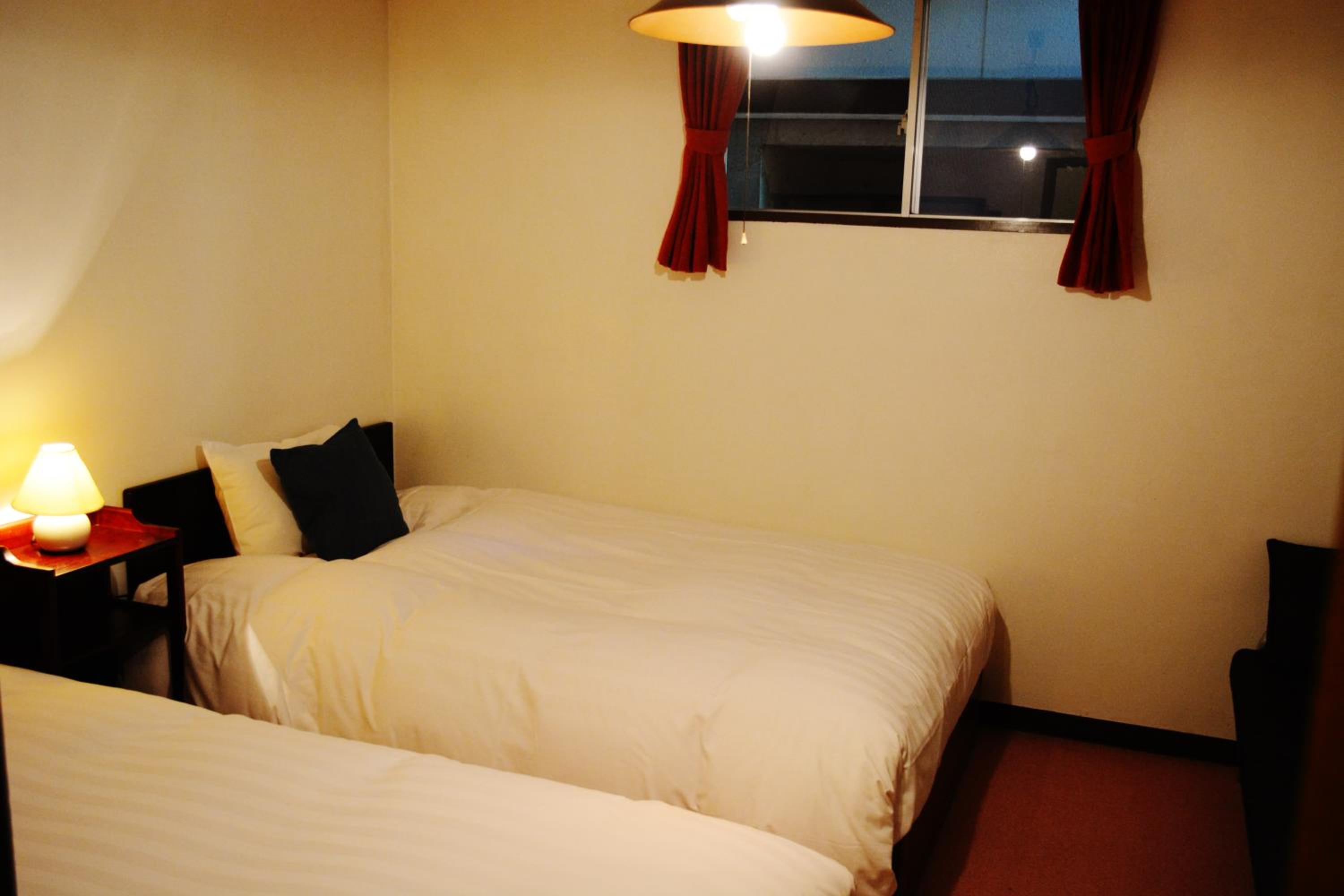Single Room with Shared Shower and Toilet