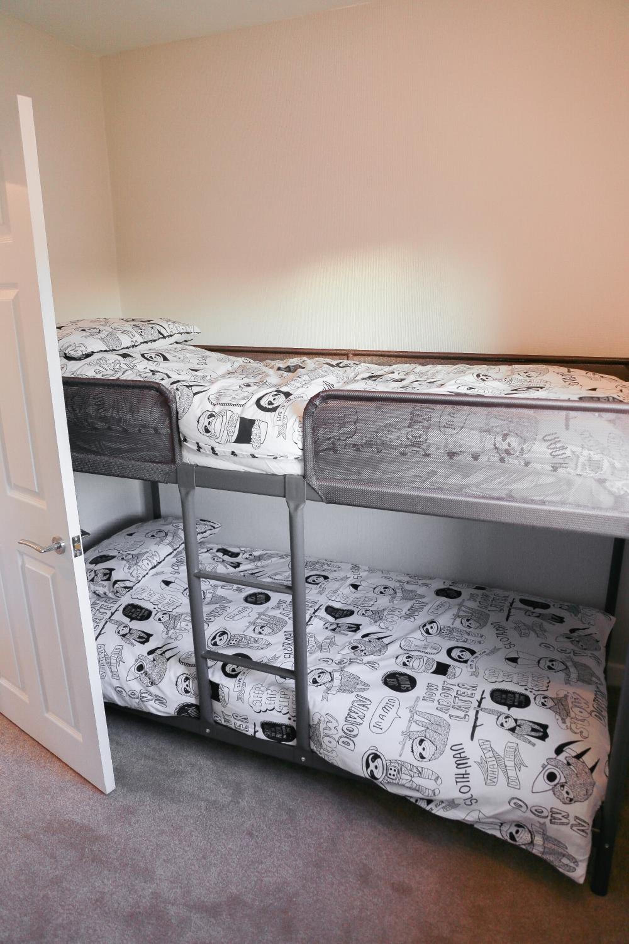 Three-Bedroom House - Photo 24