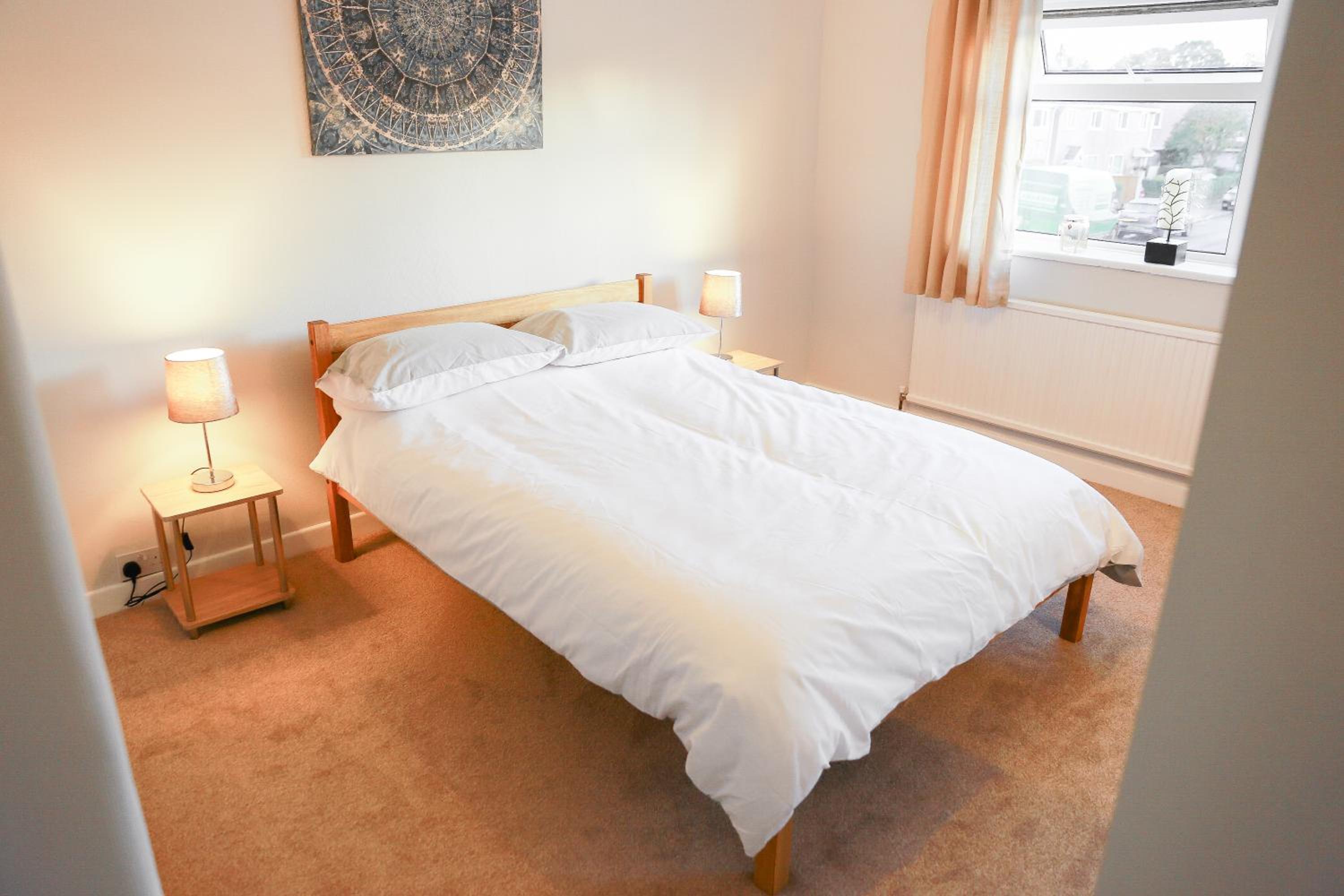 Three-Bedroom House - Photo 25