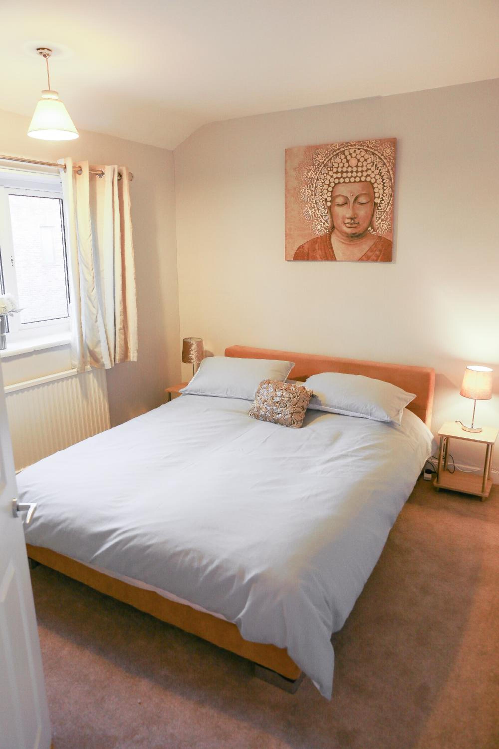 Three-Bedroom House - Photo 27