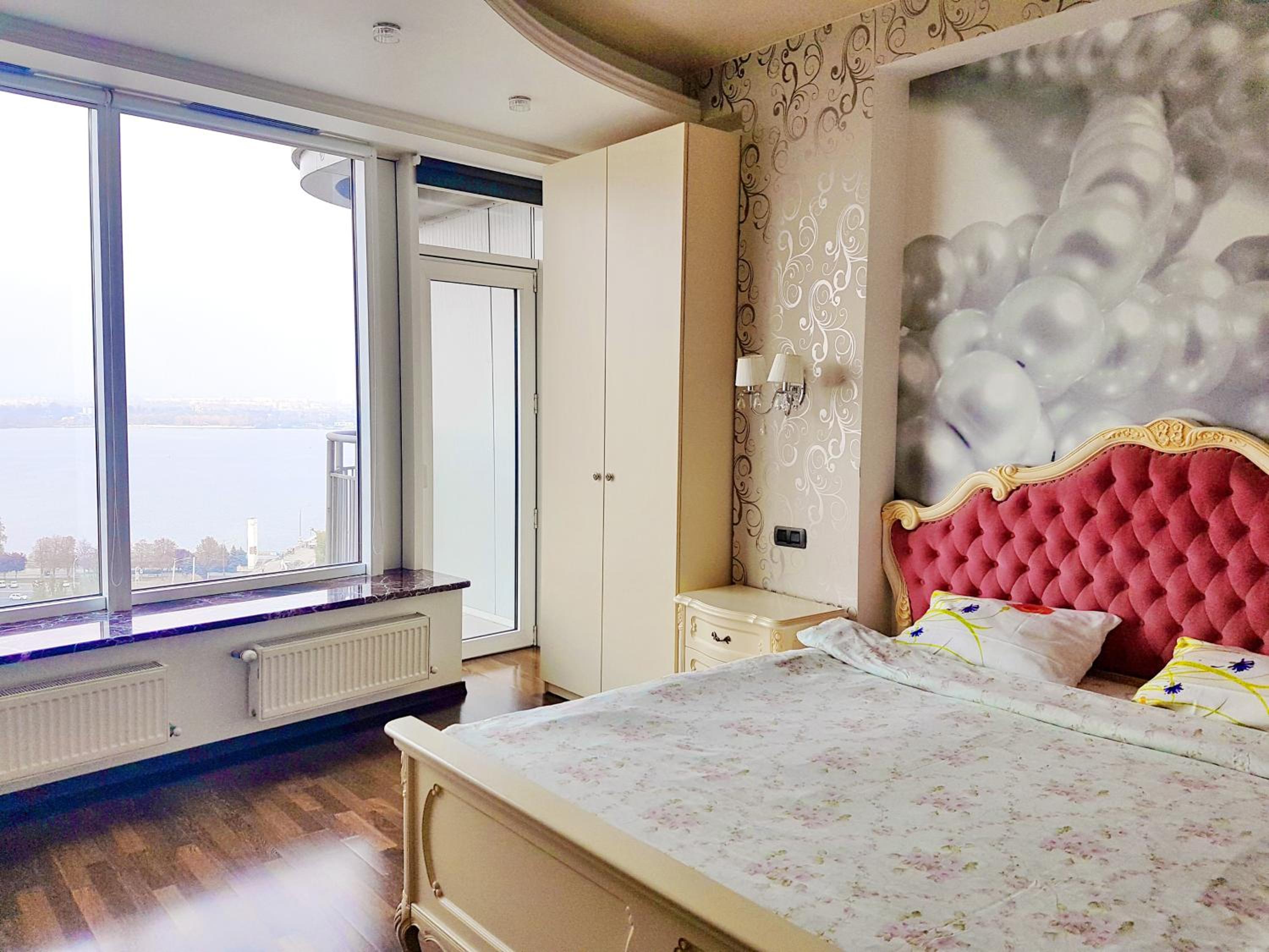 Spacious One-Bedroom Apartment with Balcony and river view