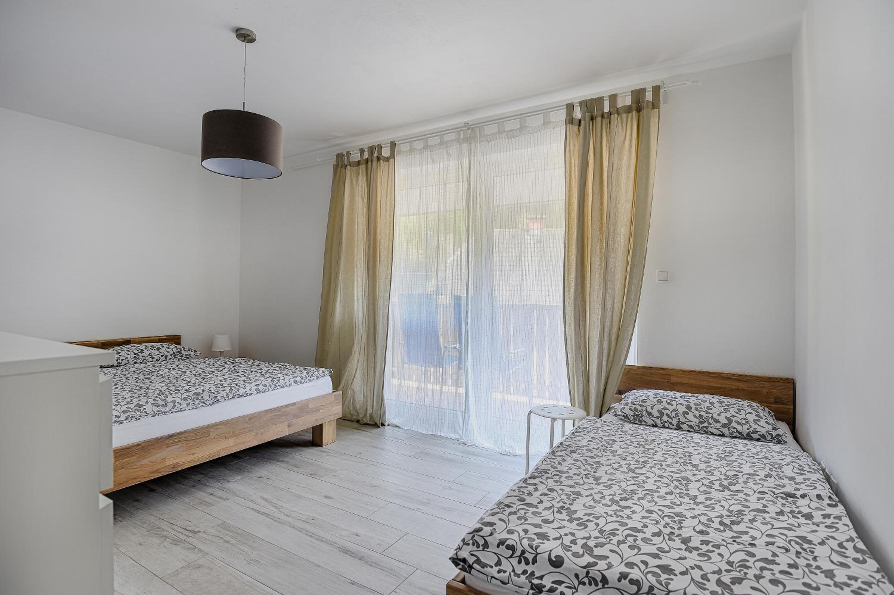 Three-Bedroom Apartment with Balcony photo 1