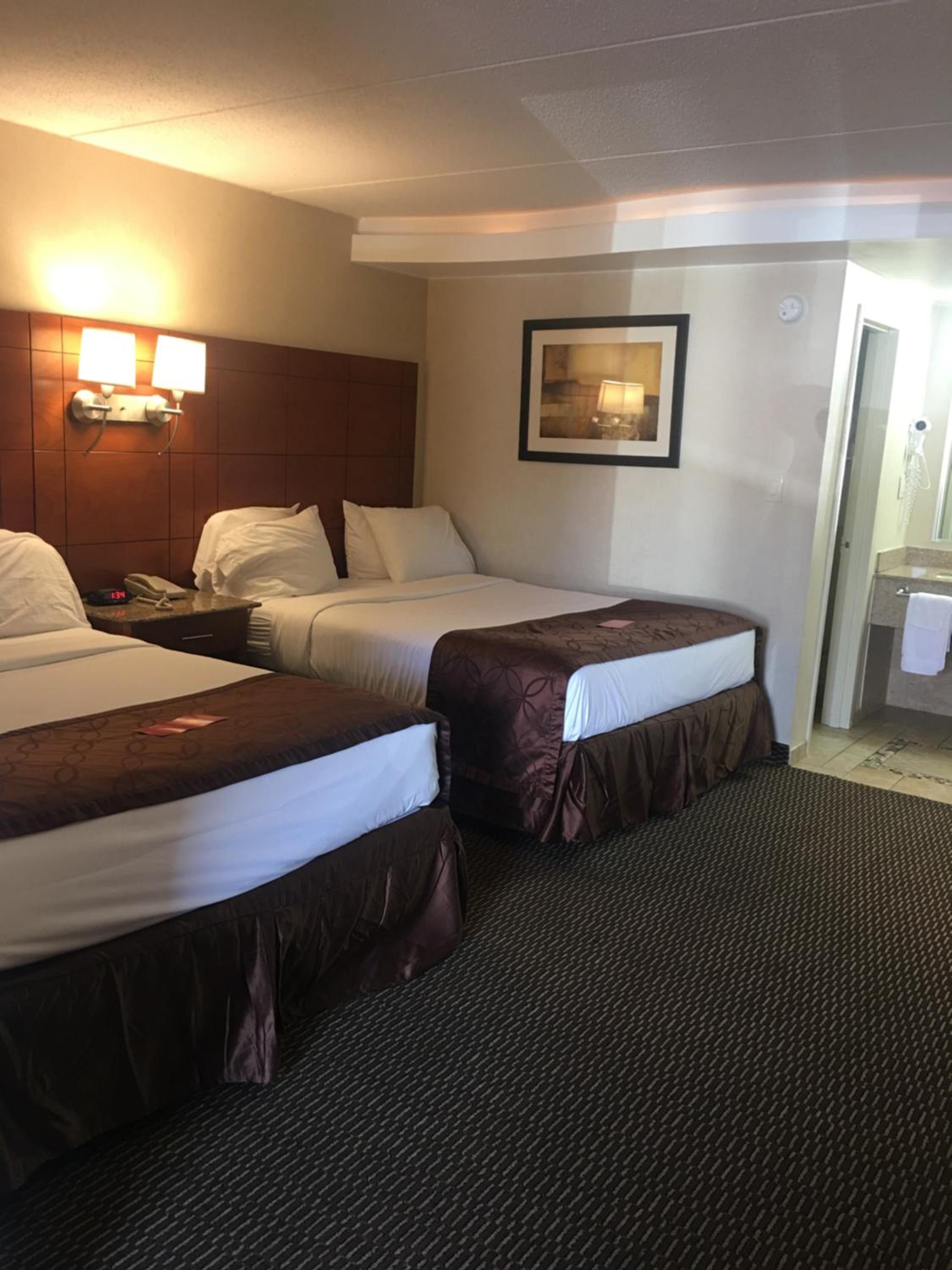 Queen Room with Two Queen Beds - Non-Smoking - Photo 1