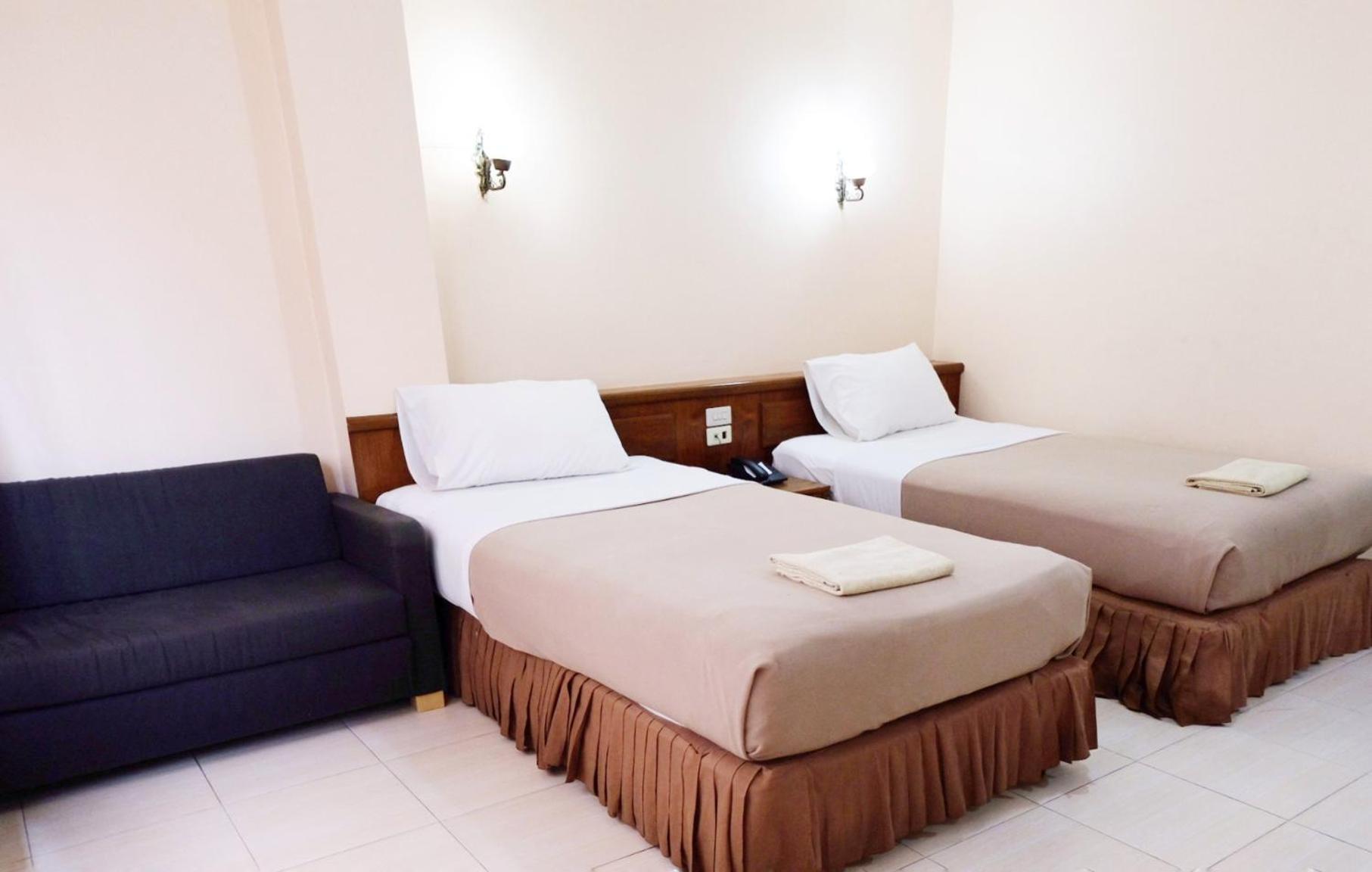 Deluxe Queen Room with Two Queen Beds - Photo 2