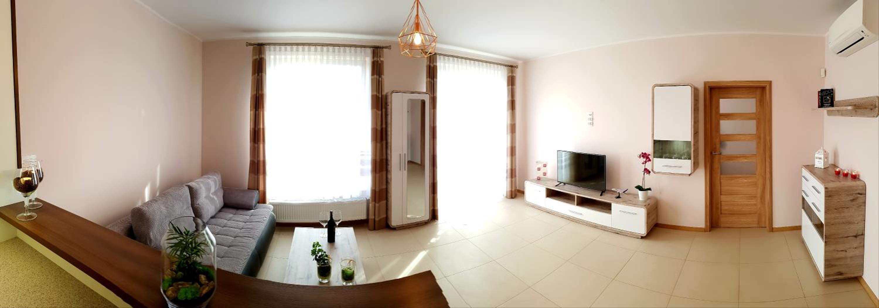 One-Bedroom Apartment with Balcony and City View - Photo 15