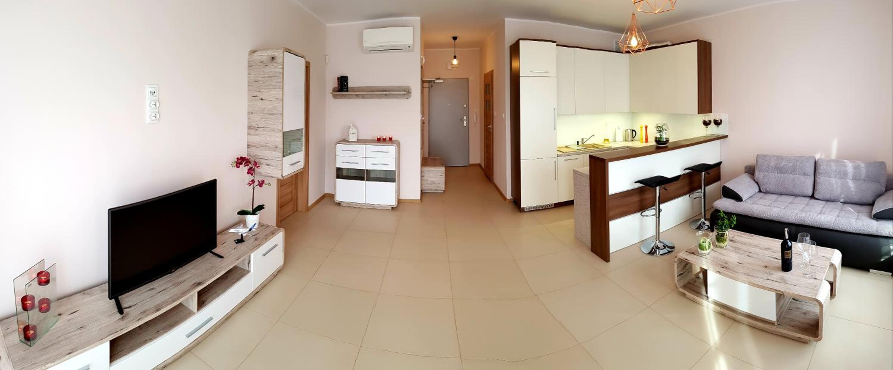 One-Bedroom Apartment with Balcony and City View - Photo 14