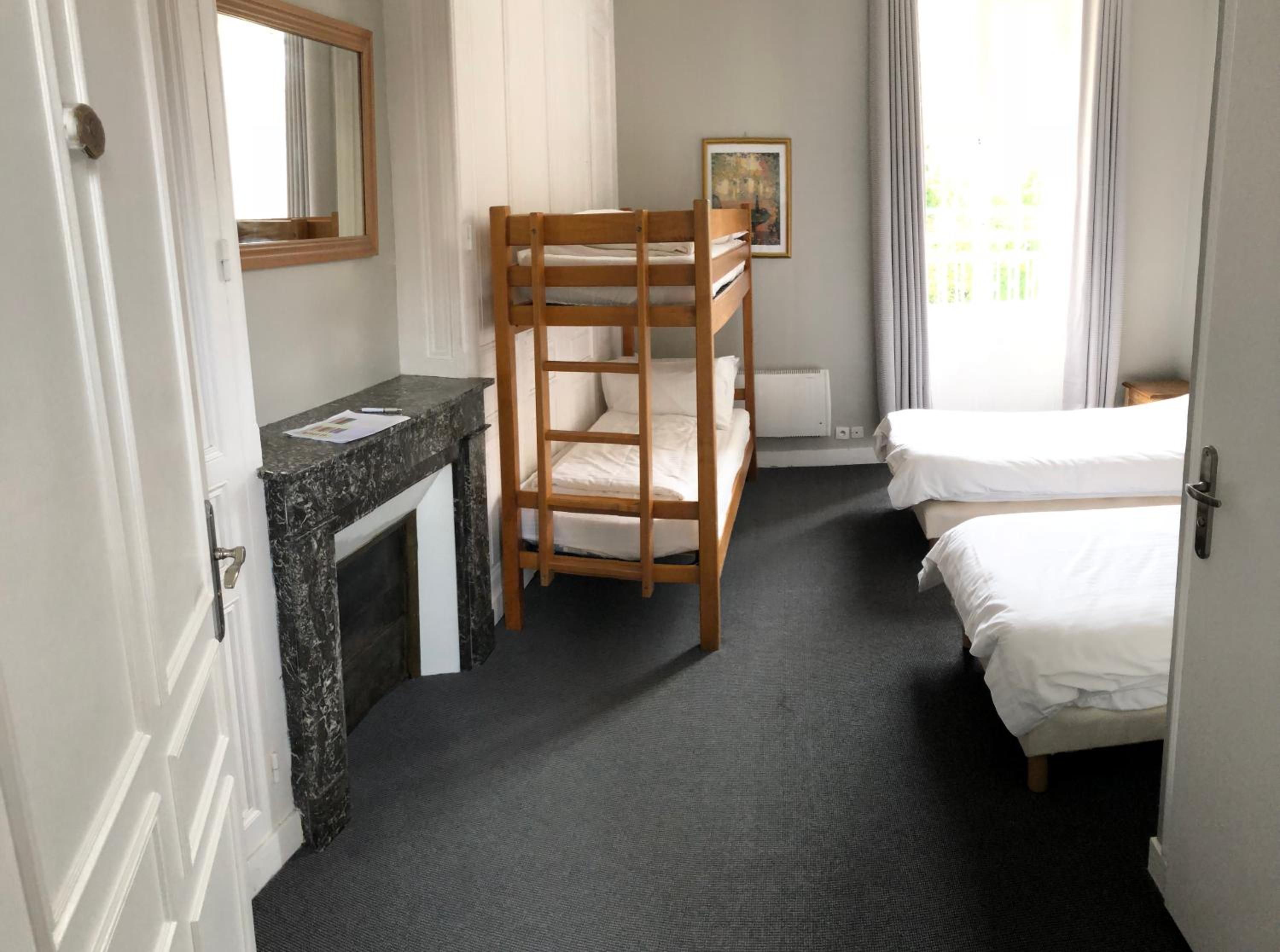 Quad Room Two Singles One Bunk photo 2