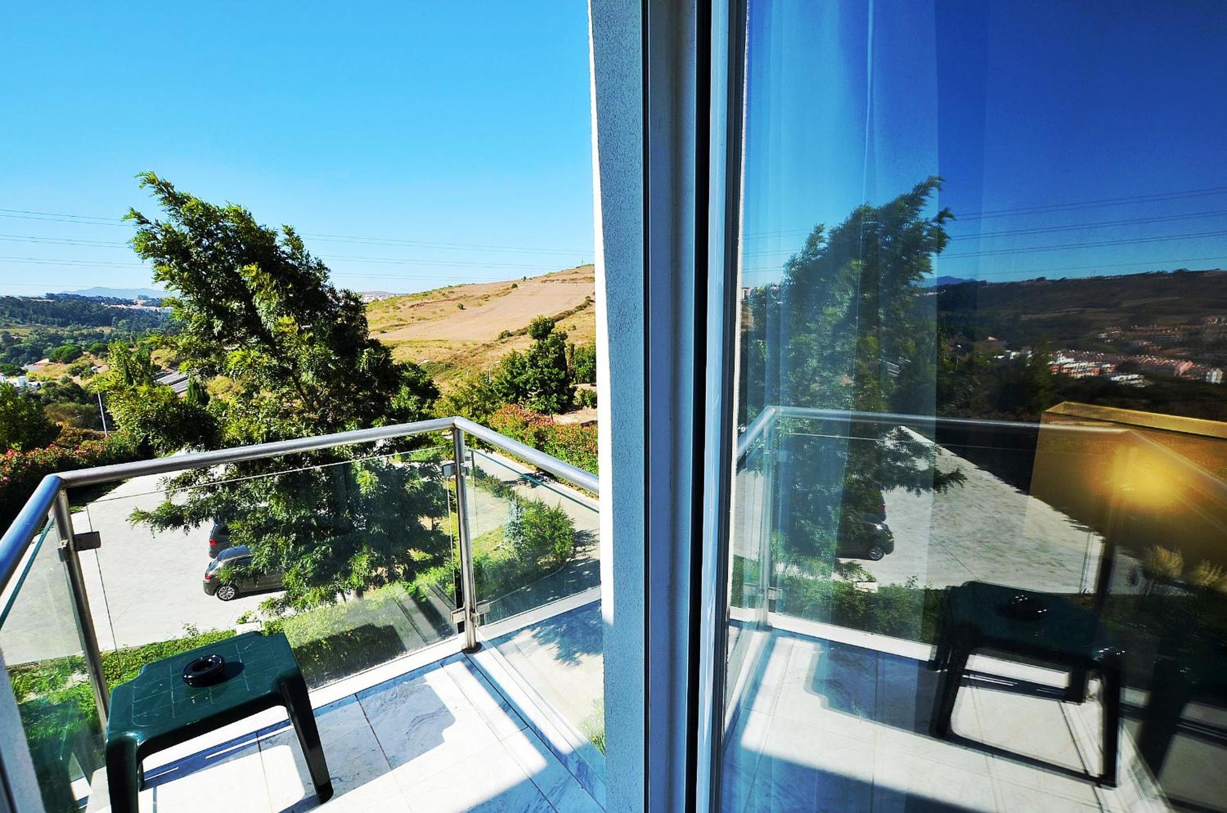 Deluxe Double Room with Balcony - Photo 7