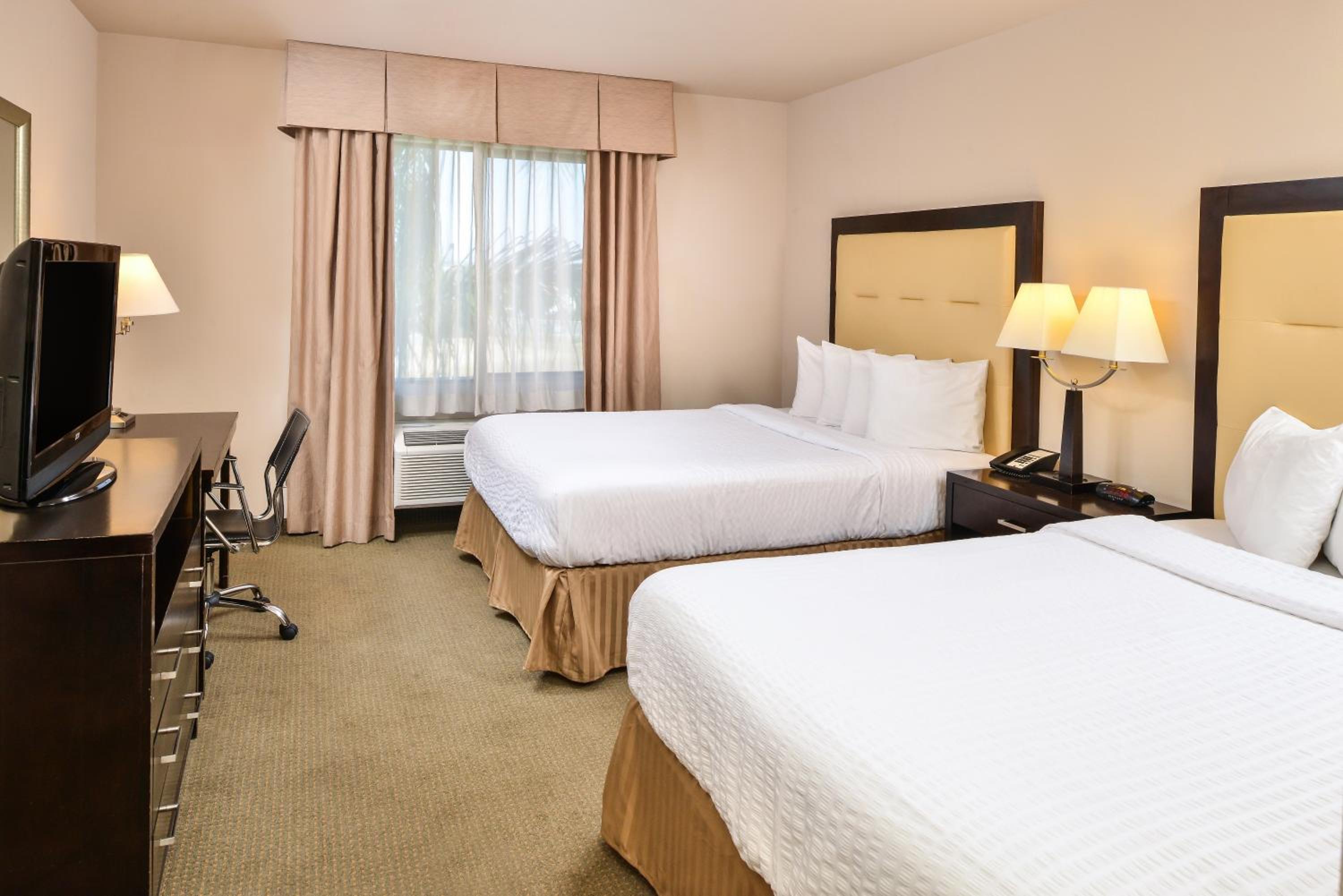 Queen Room with Two Queen Beds - Photo 1