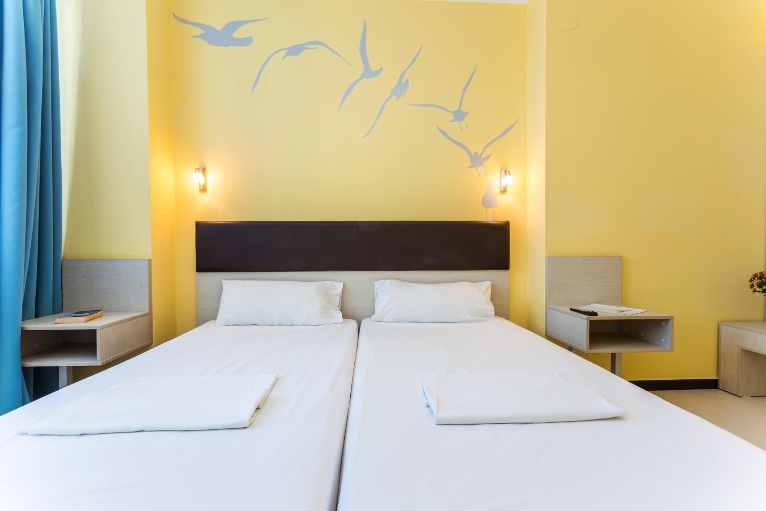 One-Bedroom Suite With Balcony (2 Adults + 2 Children)