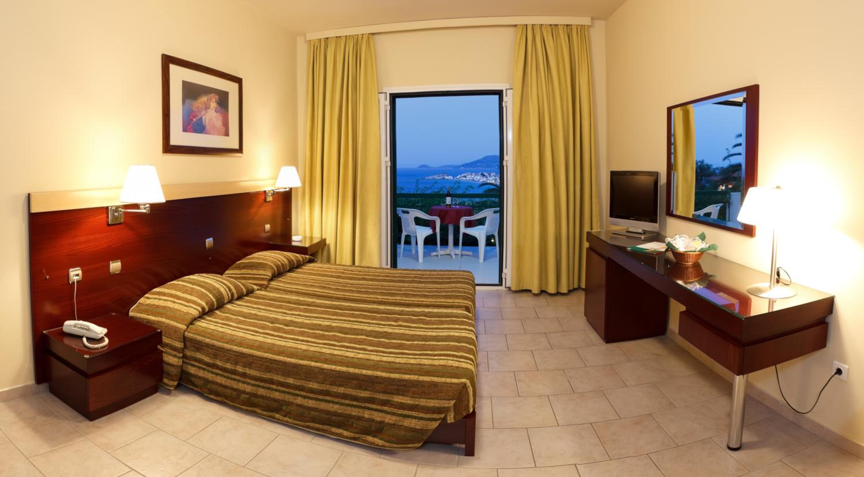 Relax in this cozy and inviting hotel room.