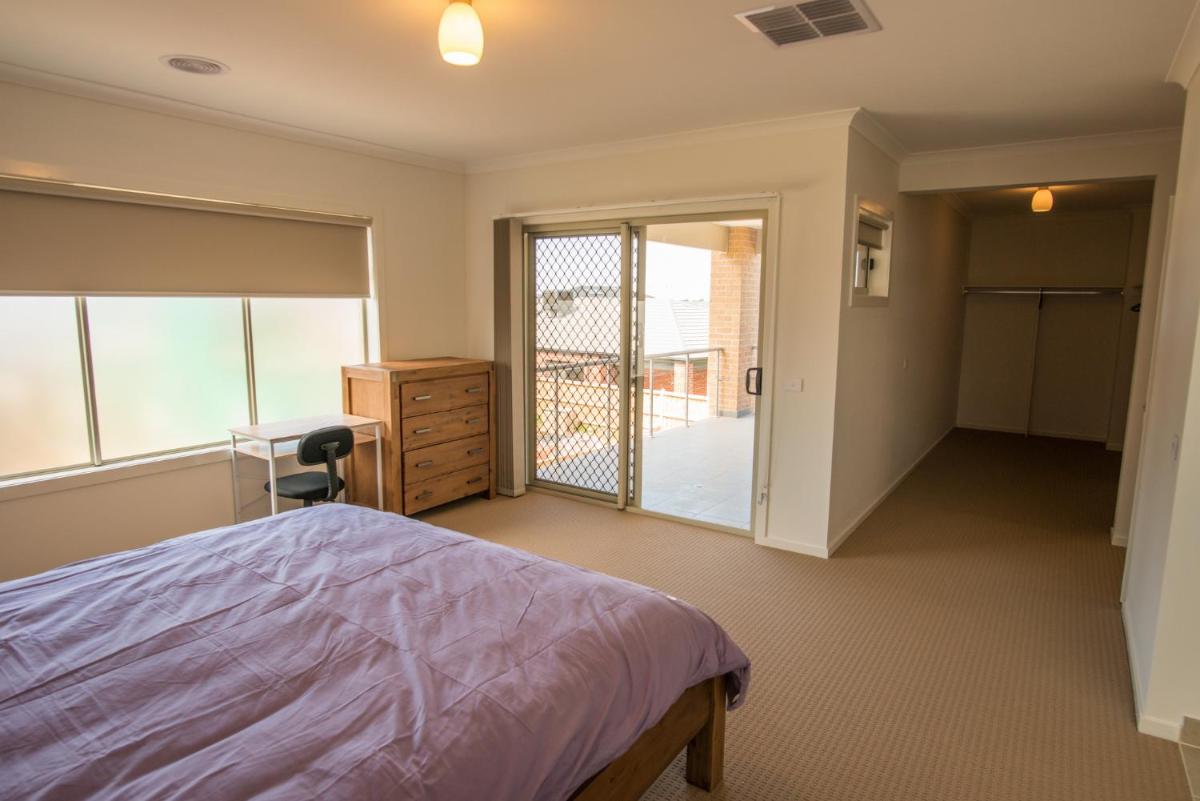 Ensuite Master Bedroom with Balcony  photo 2