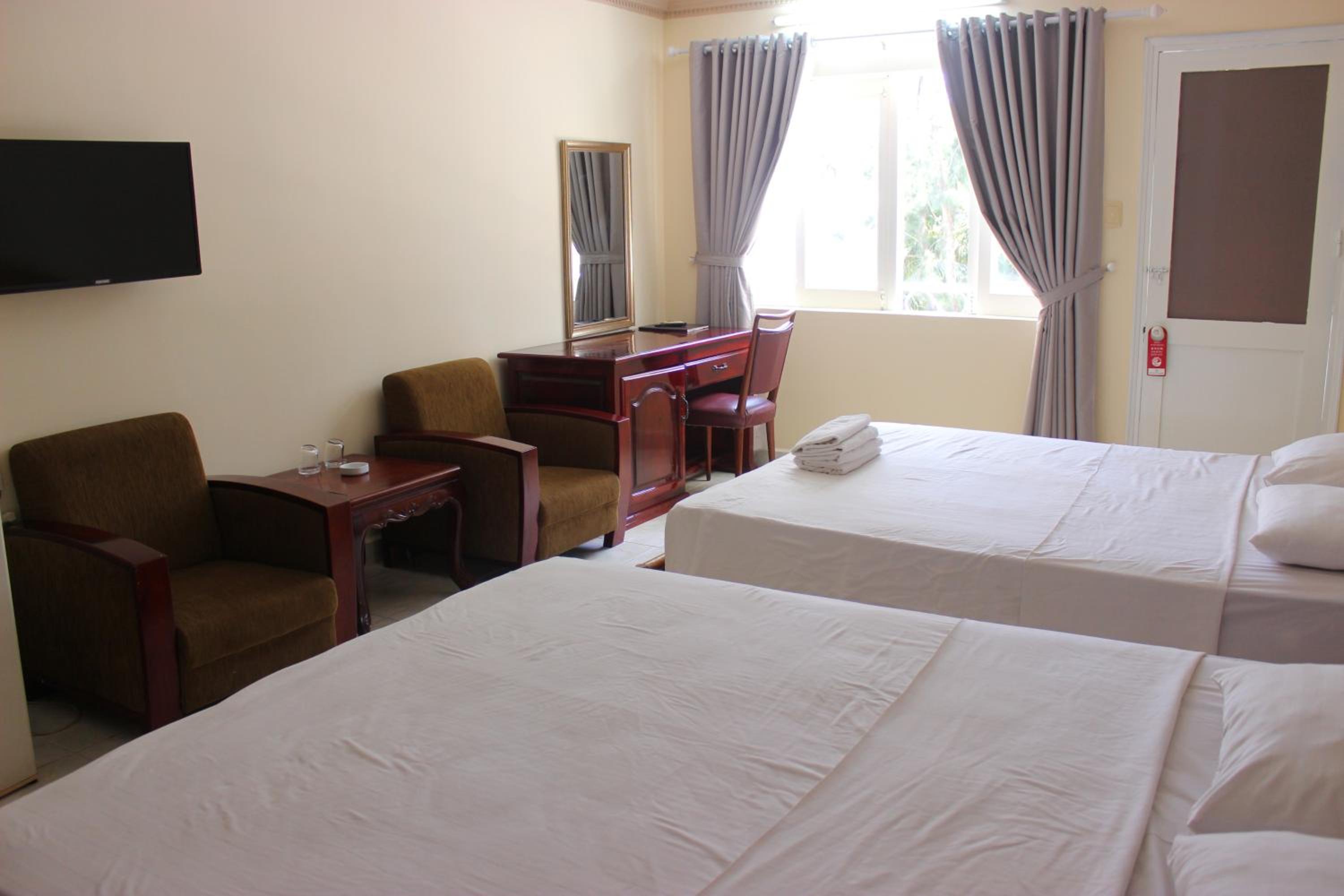 Standard Quadruple Room - Photo 10