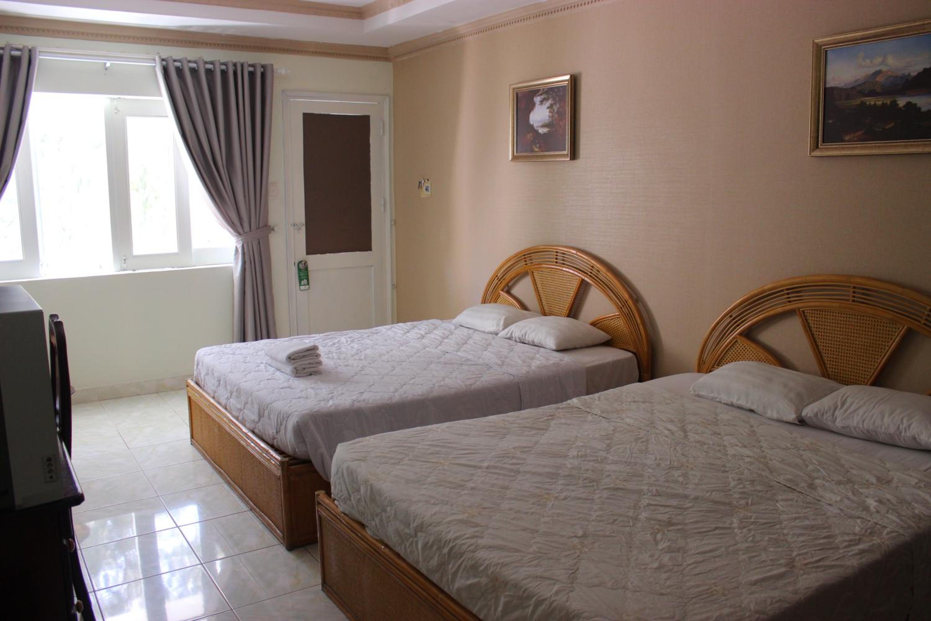 Standard Quadruple Room - Photo 7