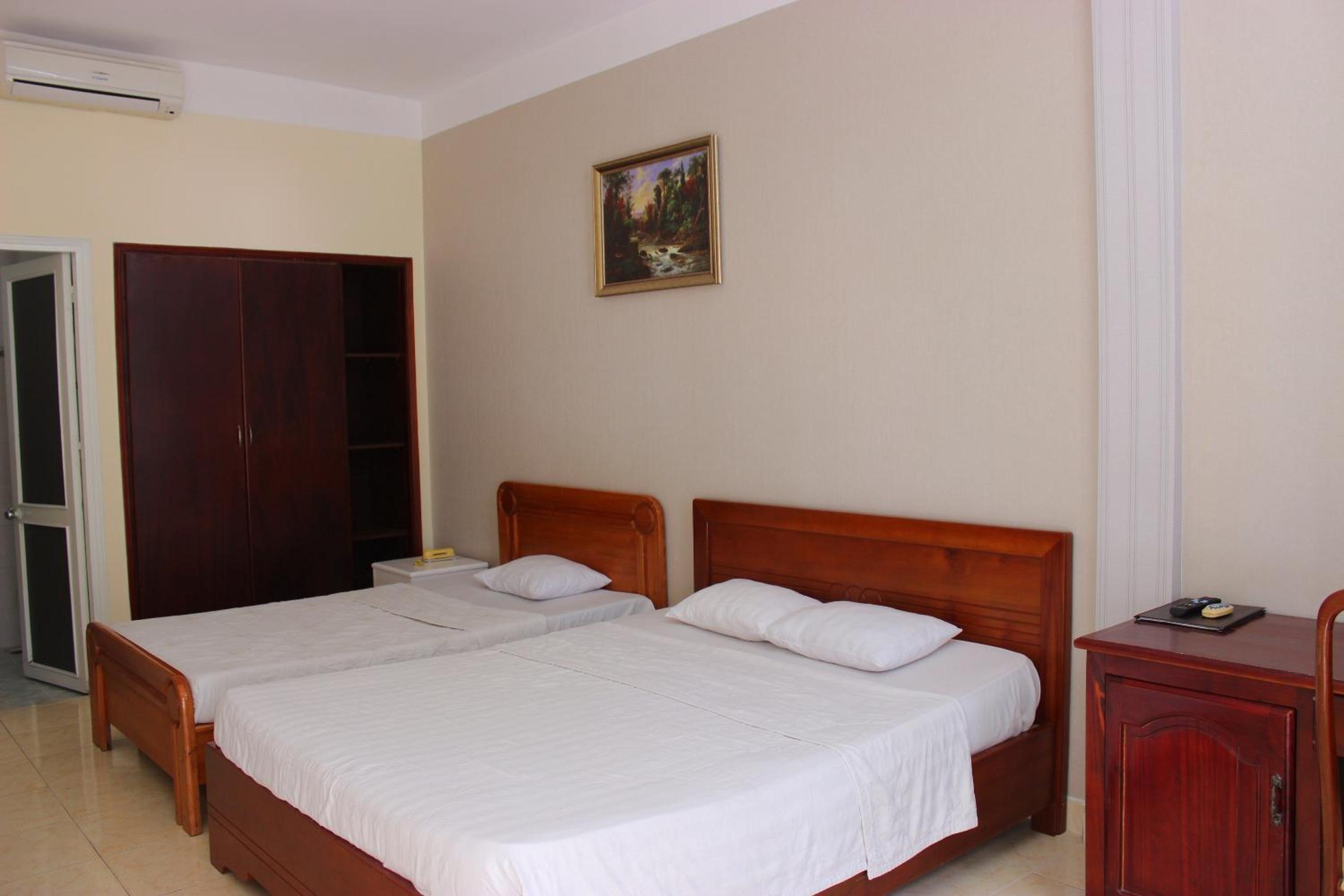 Standard Triple Room - Photo 10