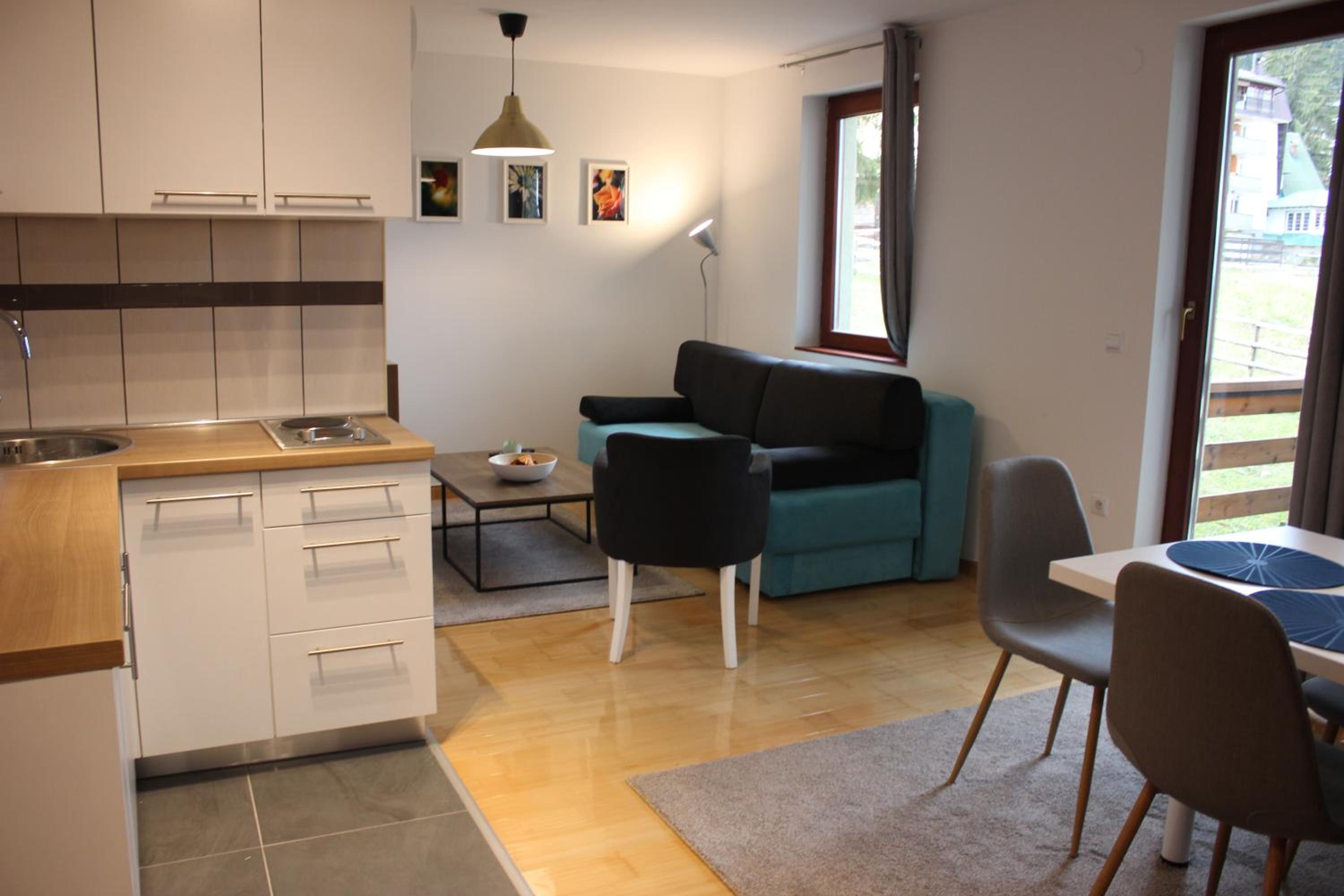 Apartment with Balcony - Photo 1