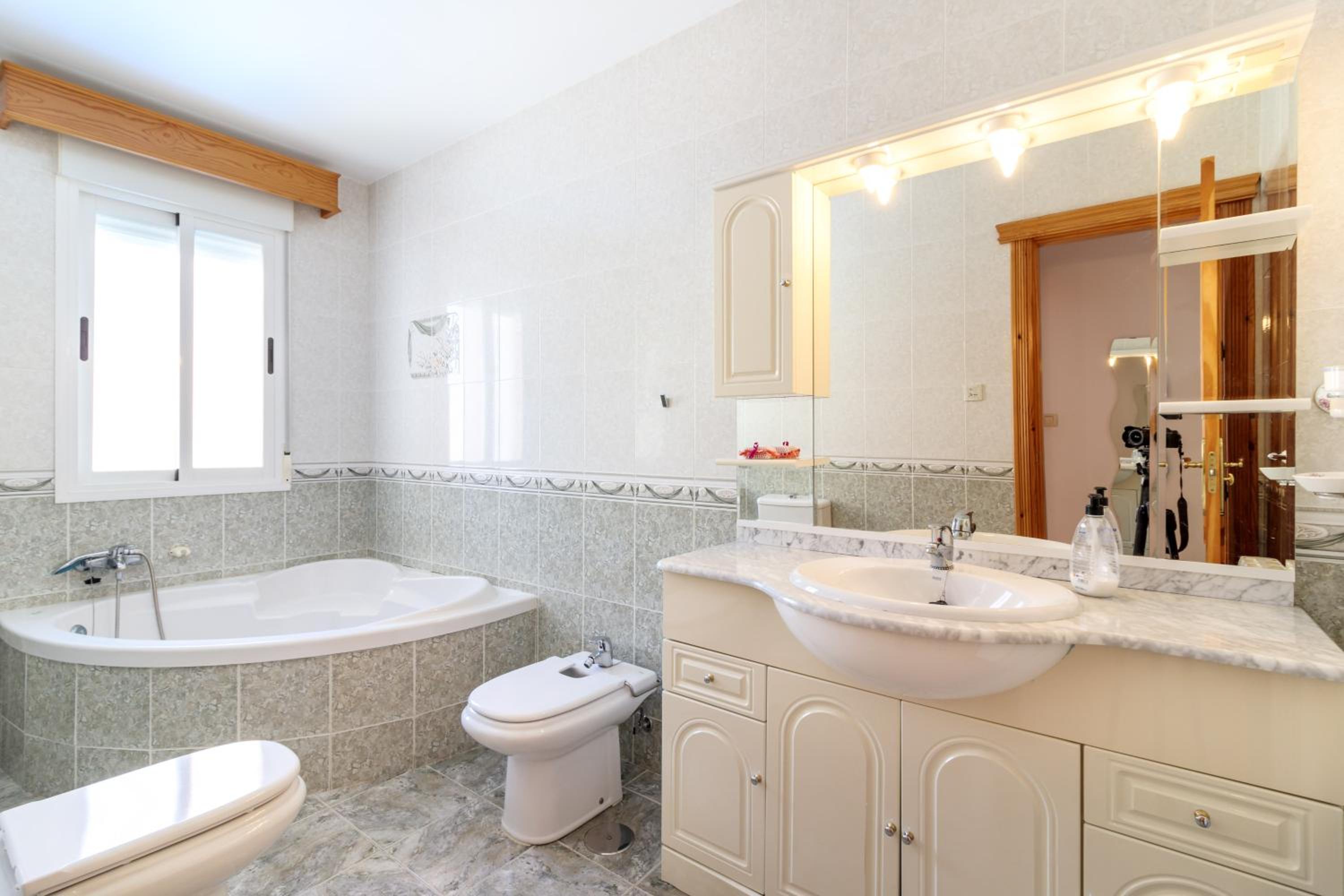 Four-Bedroom House - Photo 21