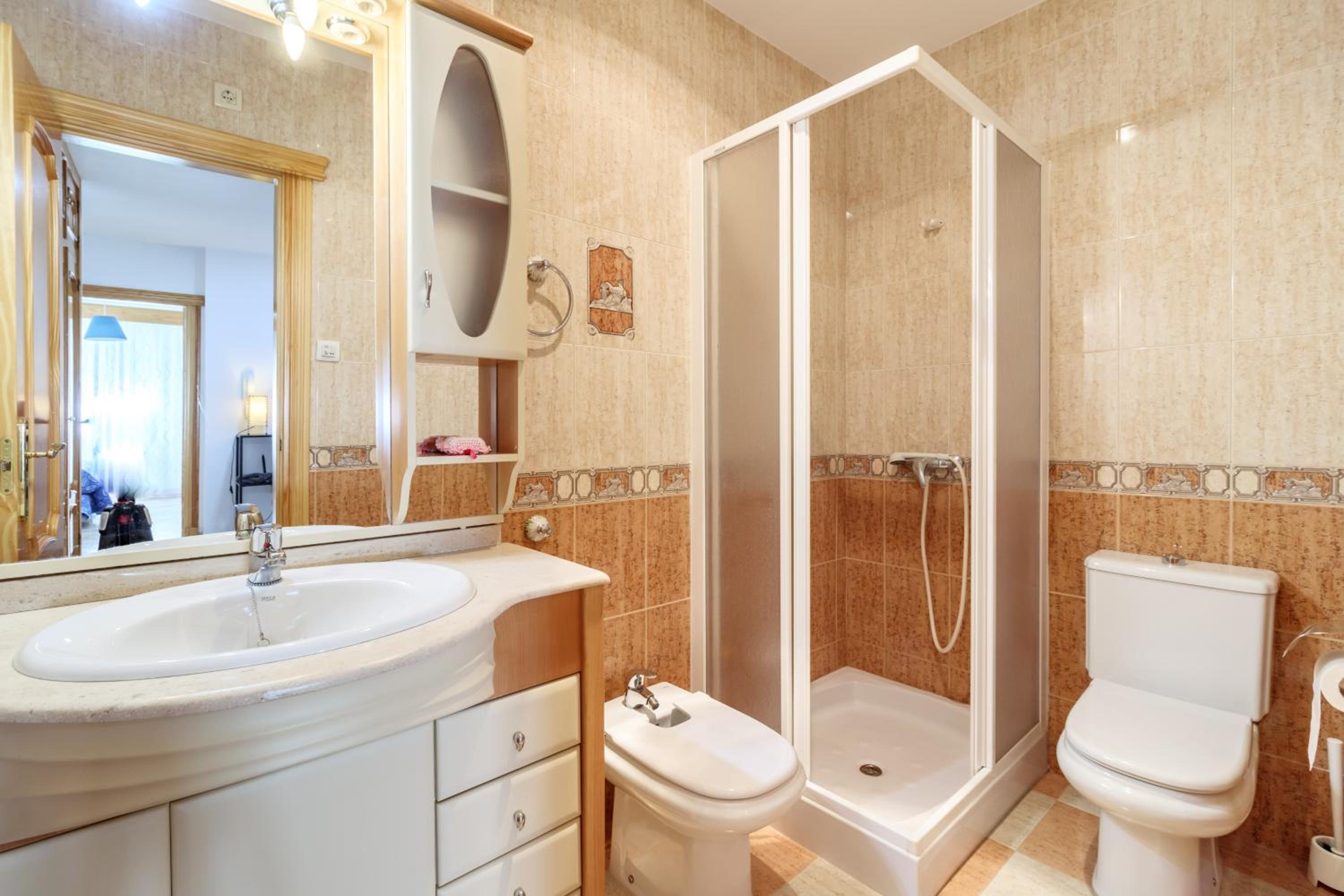 Four-Bedroom House - Photo 26