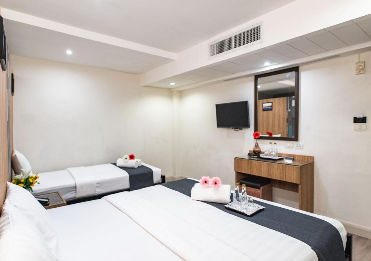 Classic Triple Room - No Window photo 2