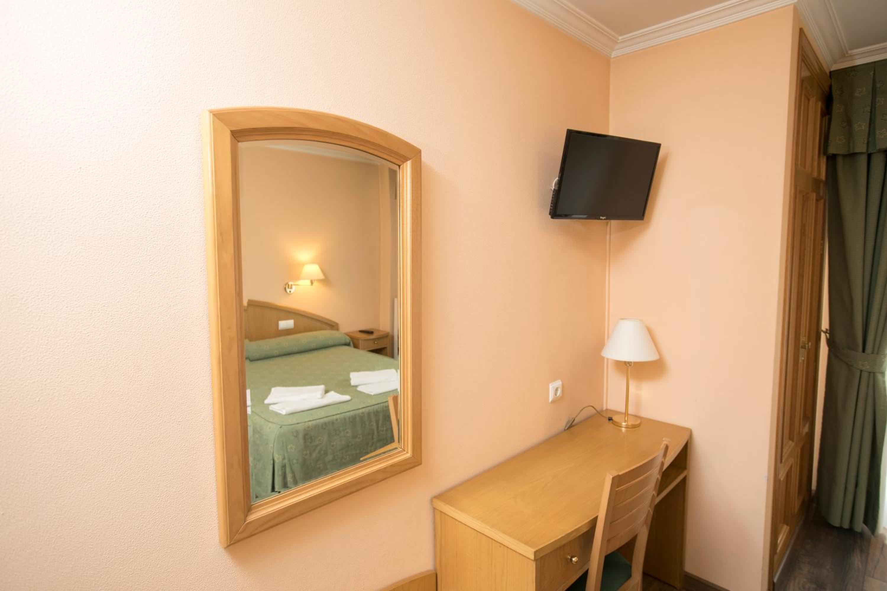 Habitación Triple con Balcón