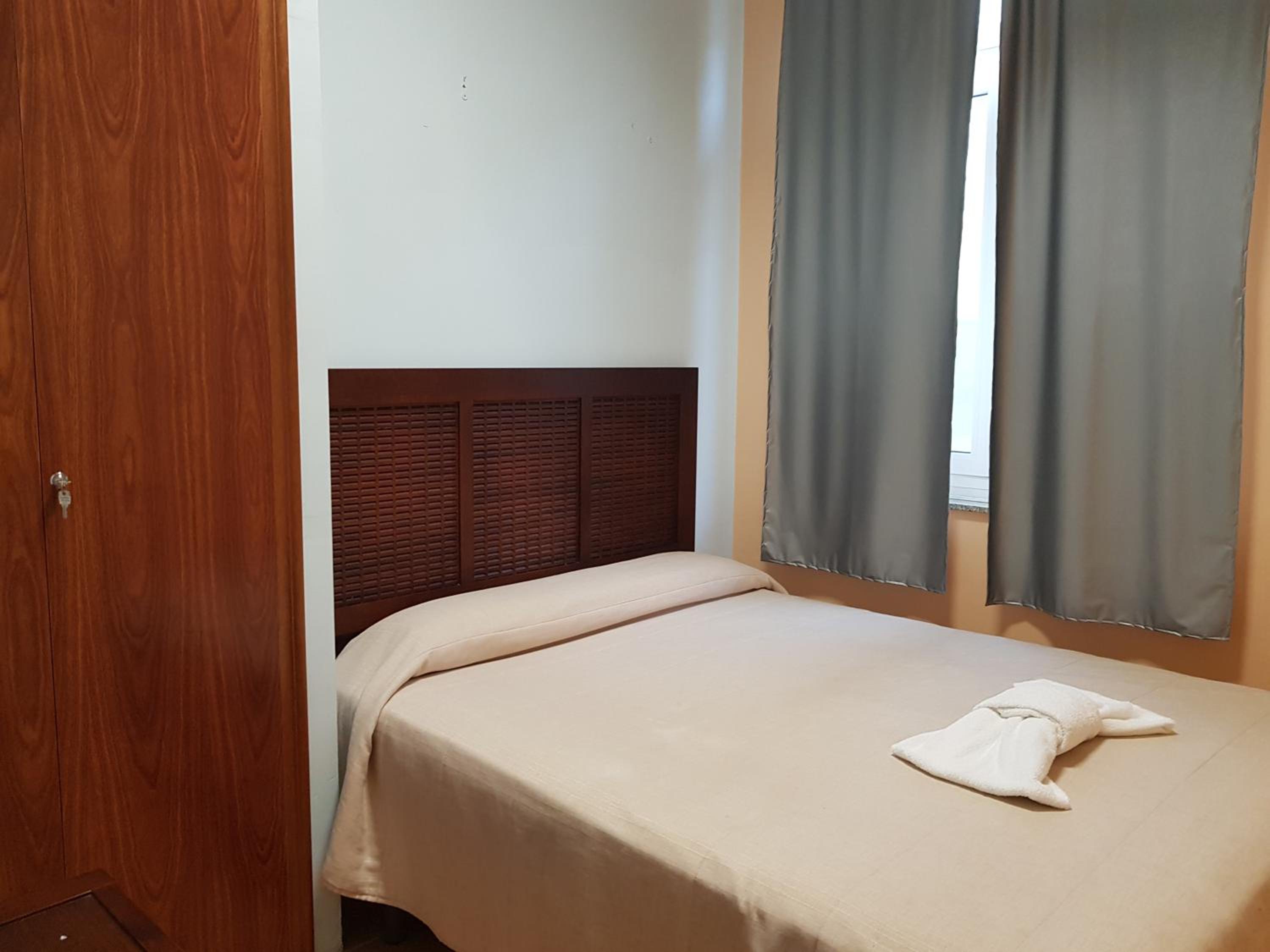 Cama en habitación compartida para 8 personas