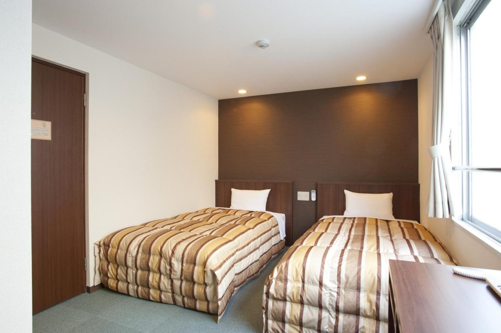 Twin Room - Non-Smoking - Photo 1