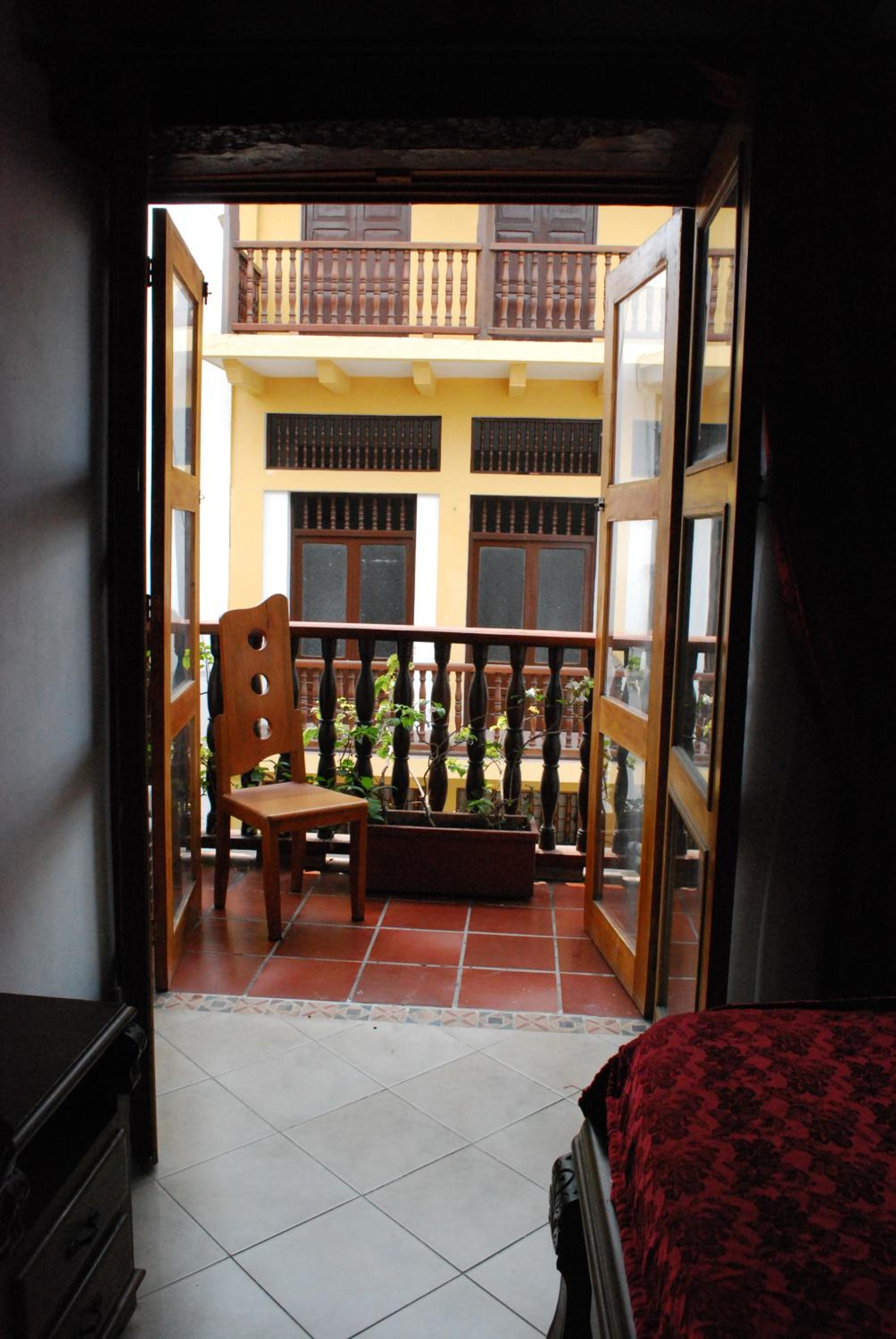 Deluxe Room with Balcony - Photo 14