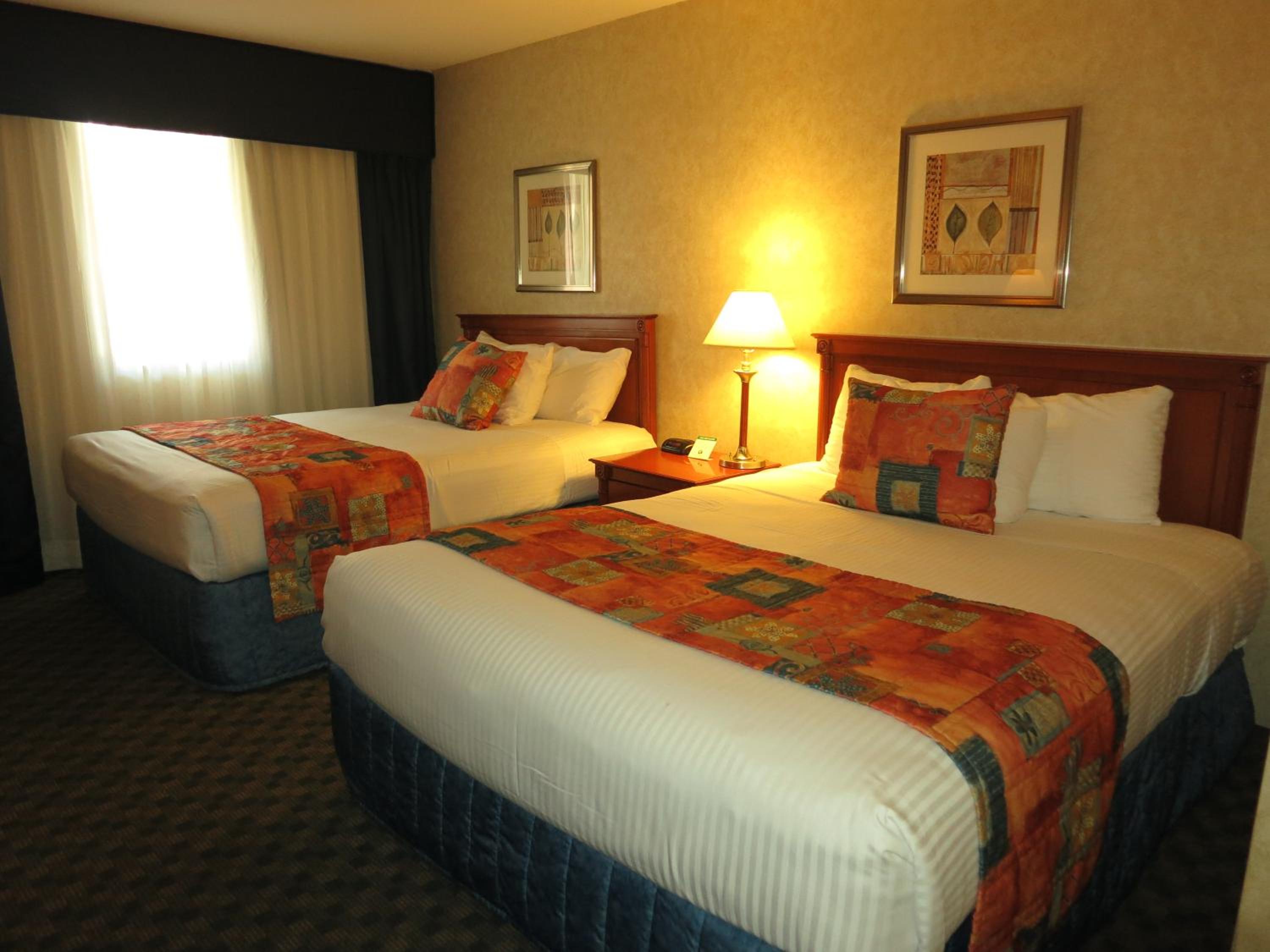 Queen Room with Two Queen Beds - Pet Friendly photo 1