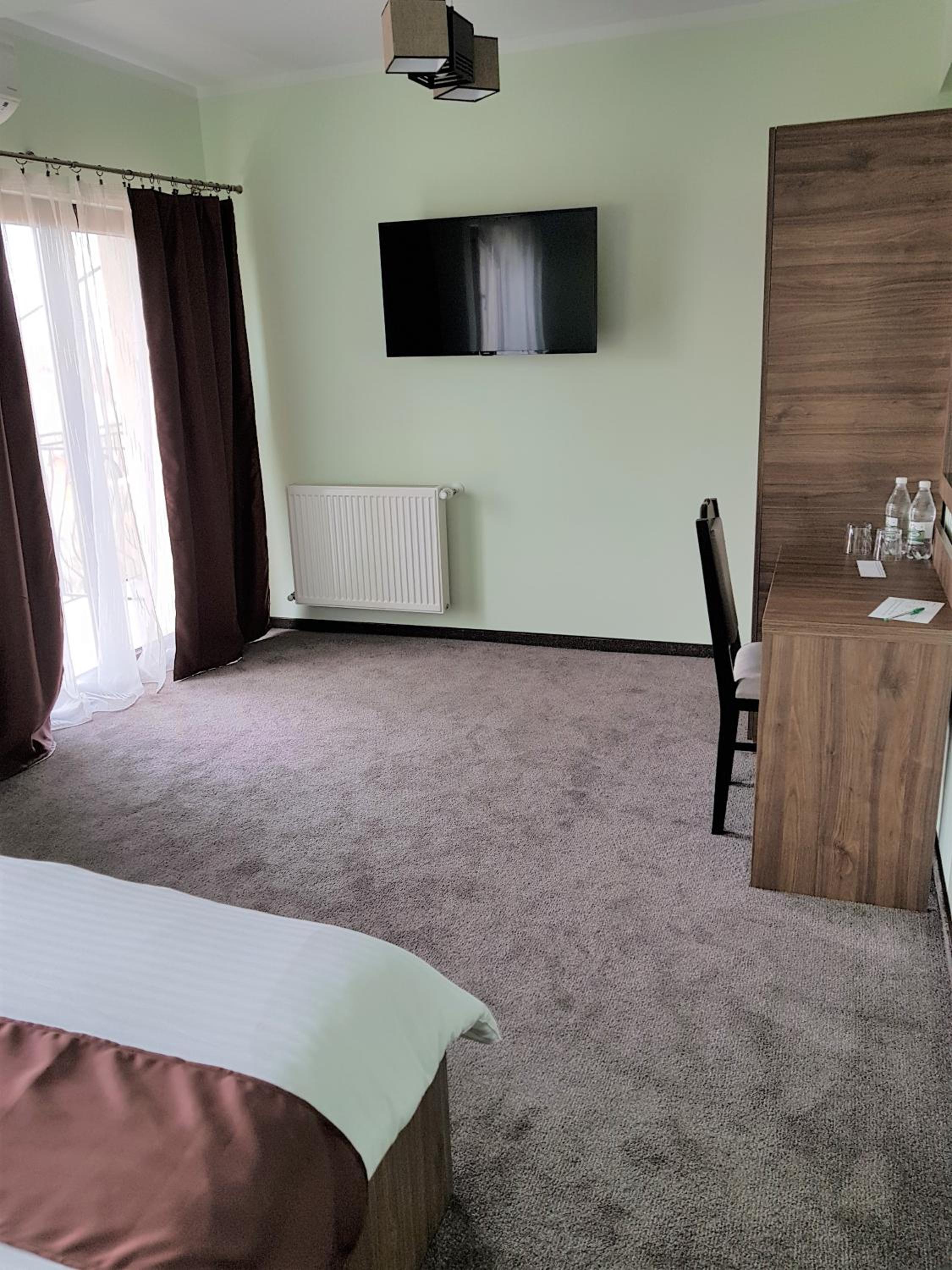 Deluxe Double Room with Balcony - Photo 1