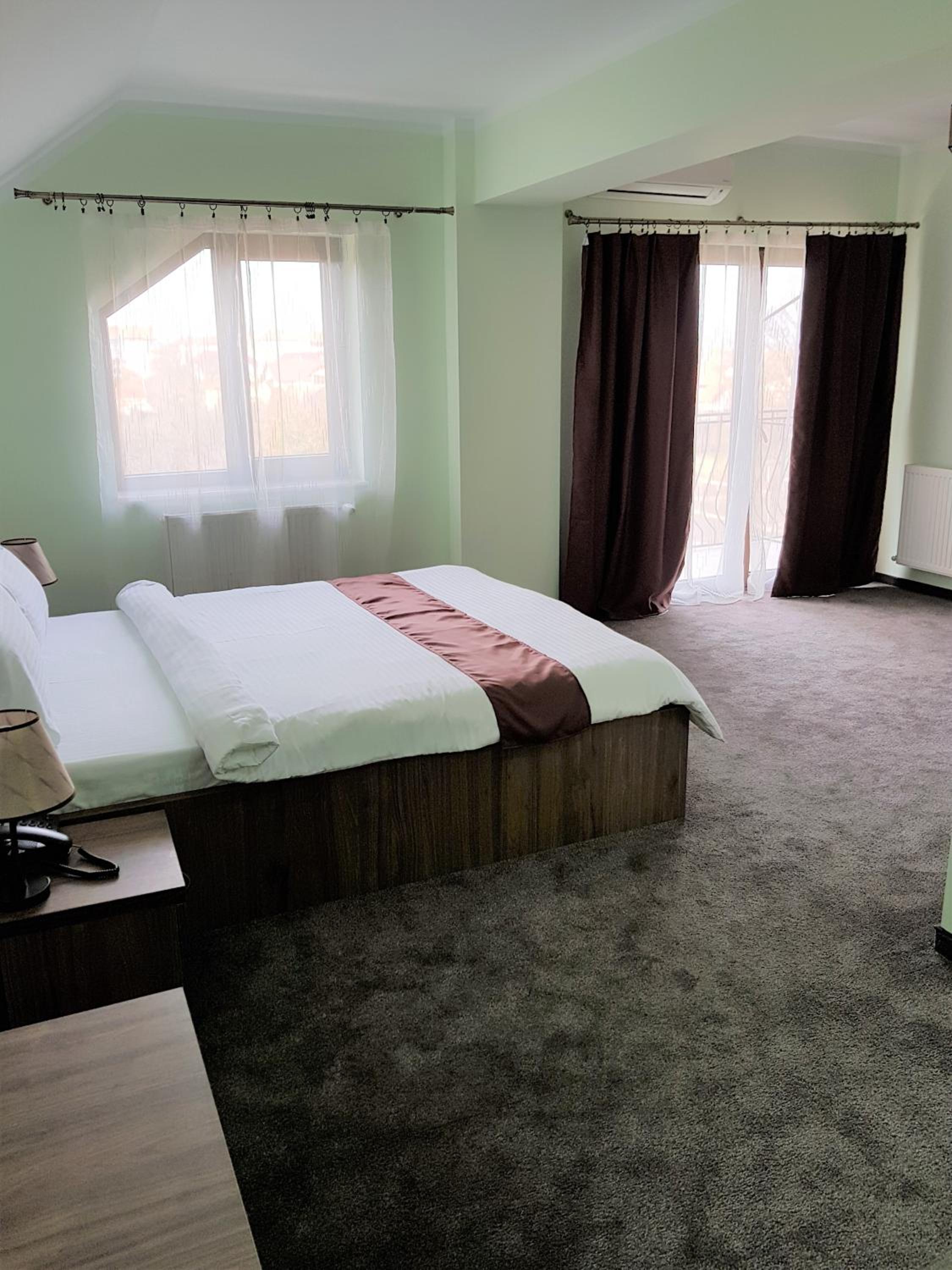 Deluxe Double Room with Balcony - Photo 2
