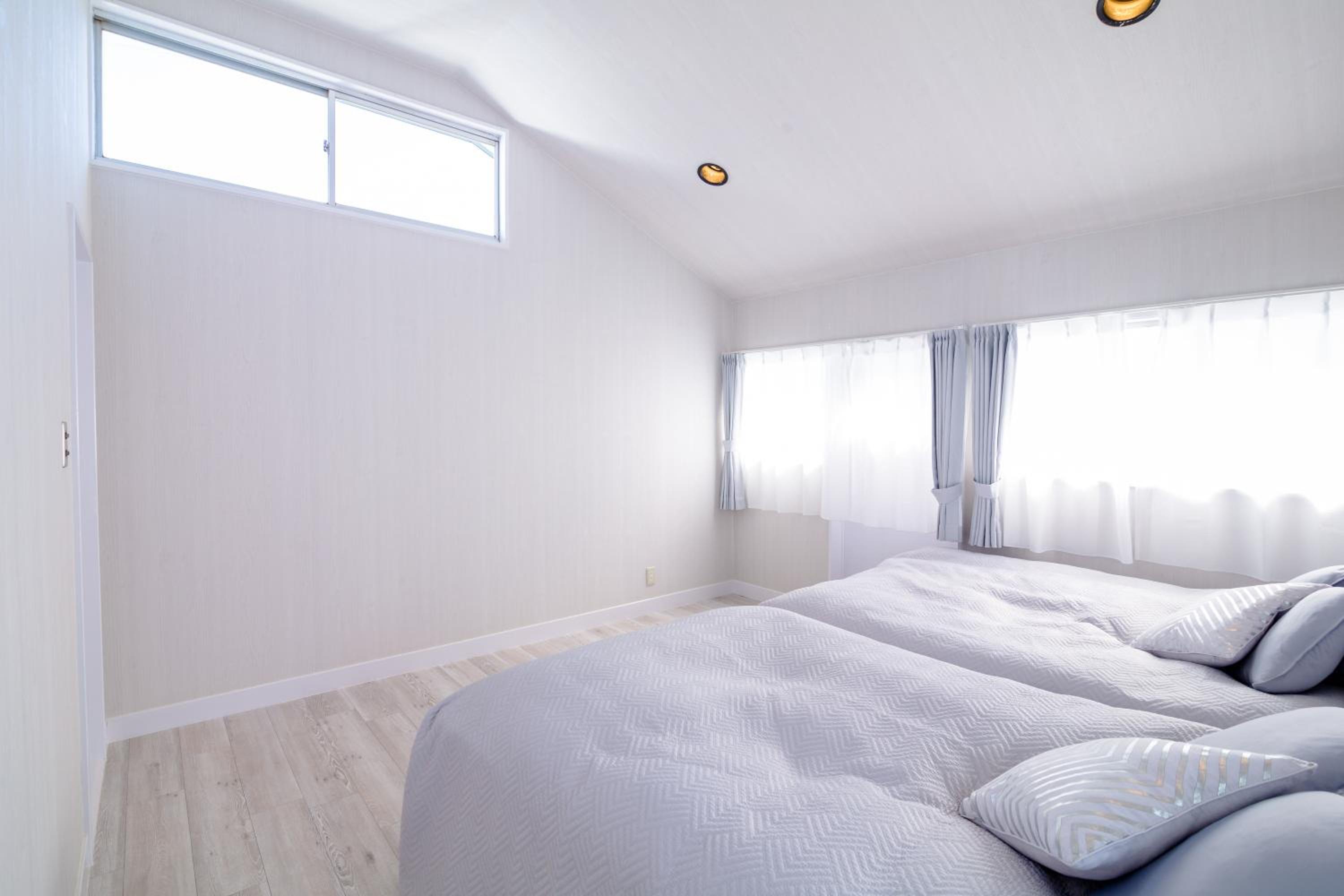 Three-Bedroom House - Photo 31