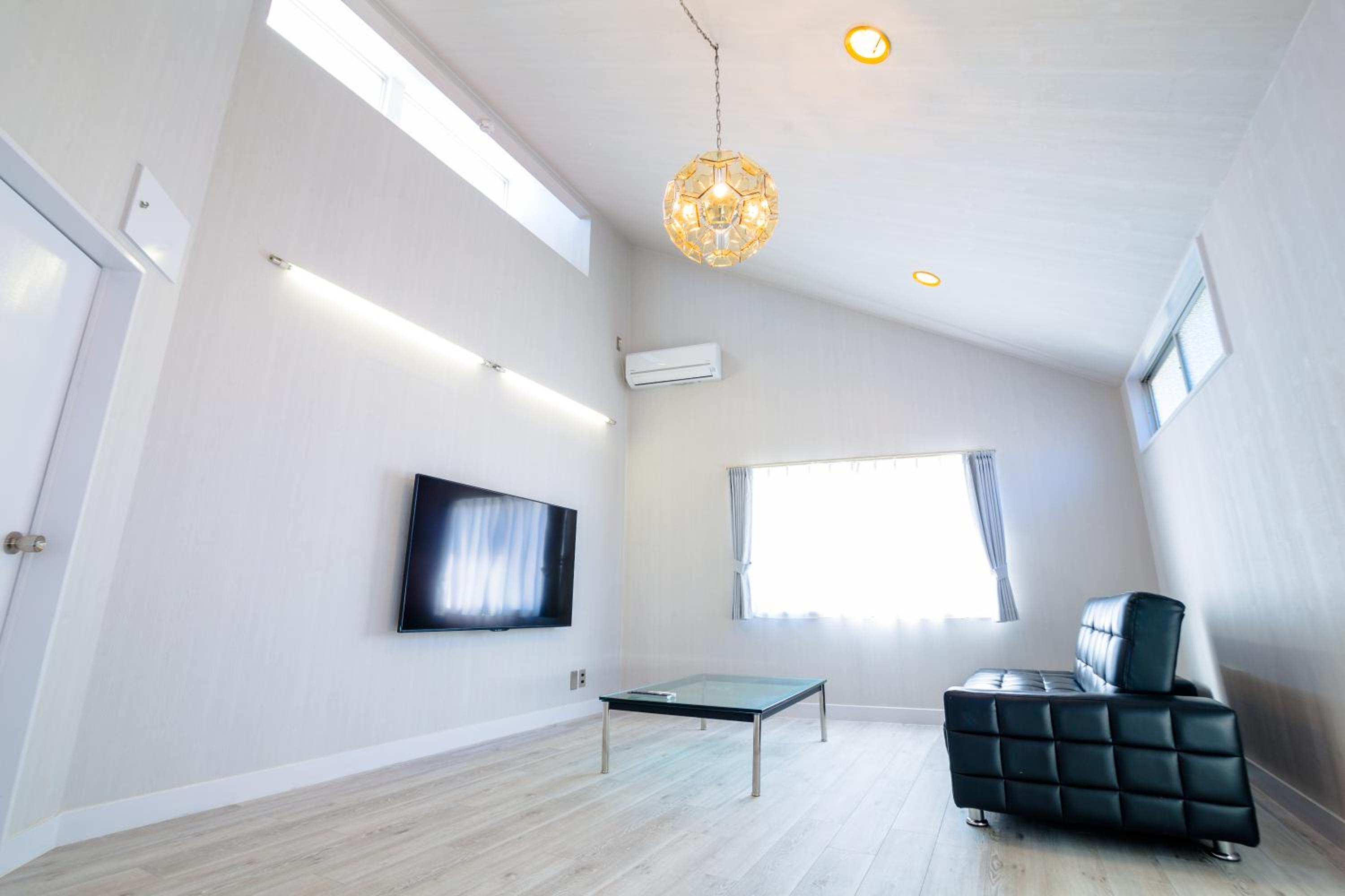 Three-Bedroom House - Photo 30