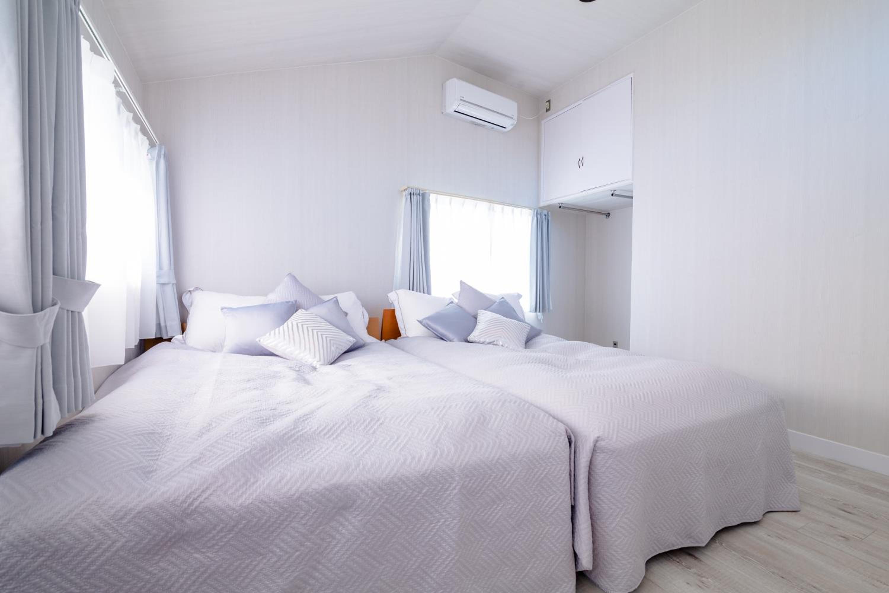 Three-Bedroom House - Photo 29