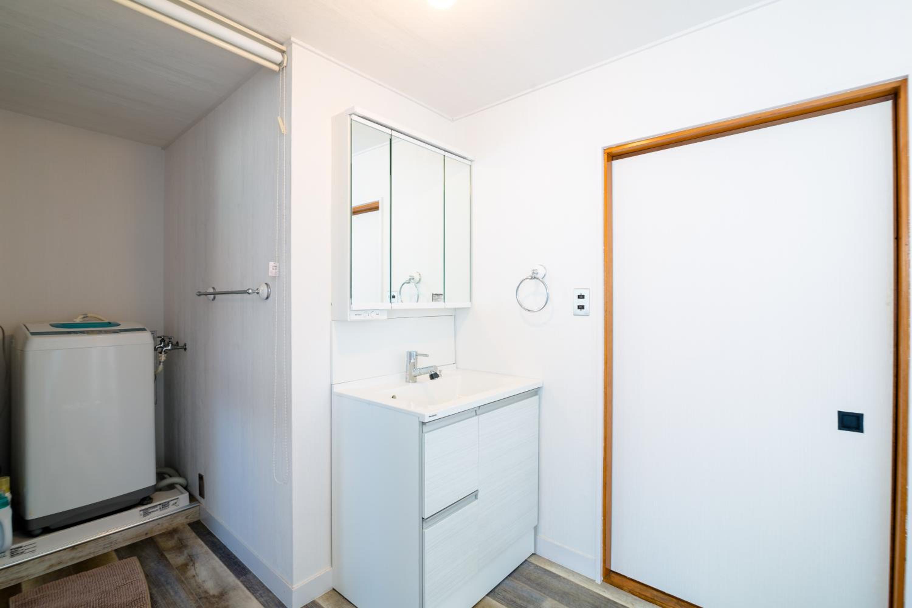 Three-Bedroom House - Photo 28