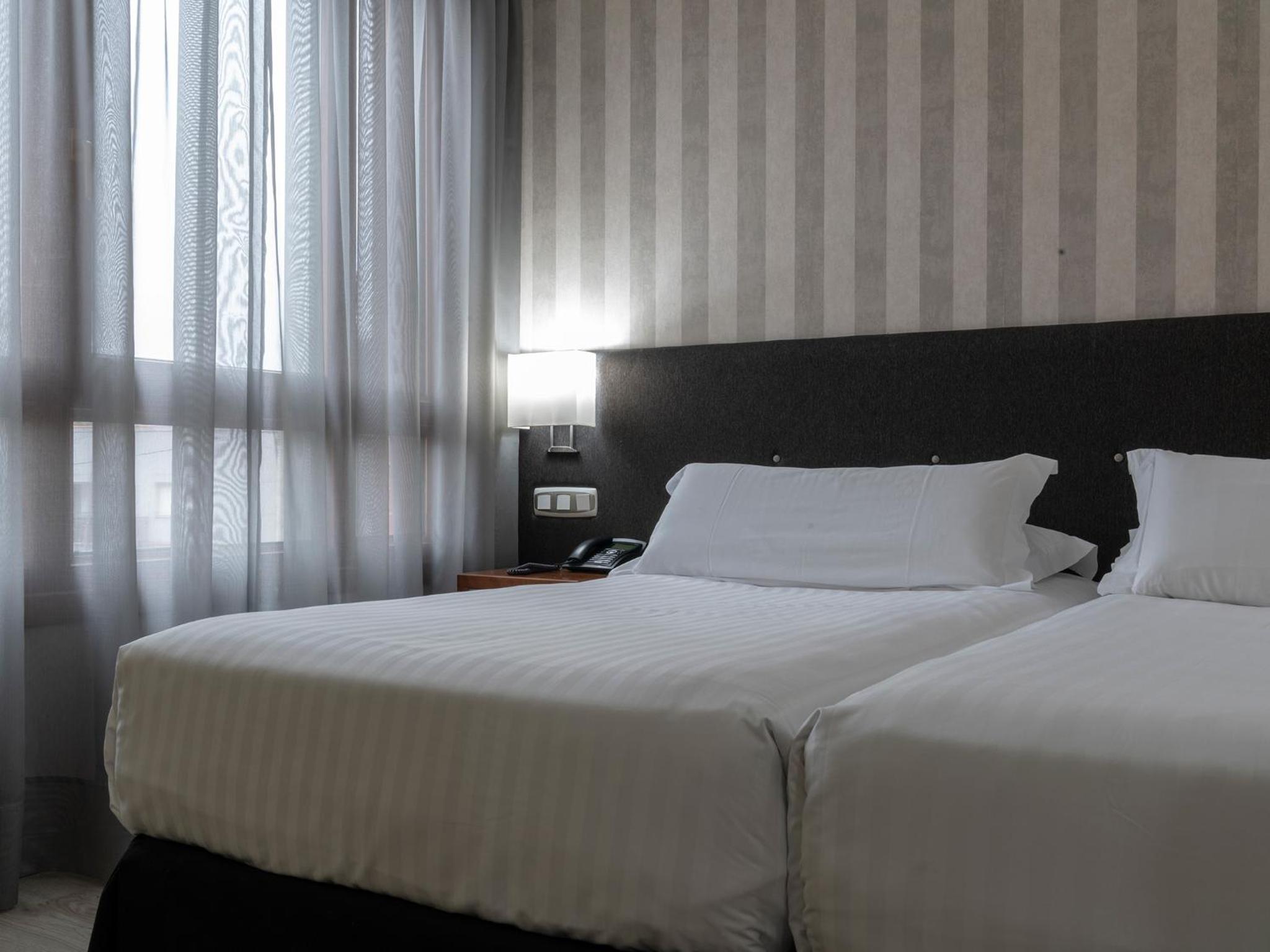Twin Room - Photo 1