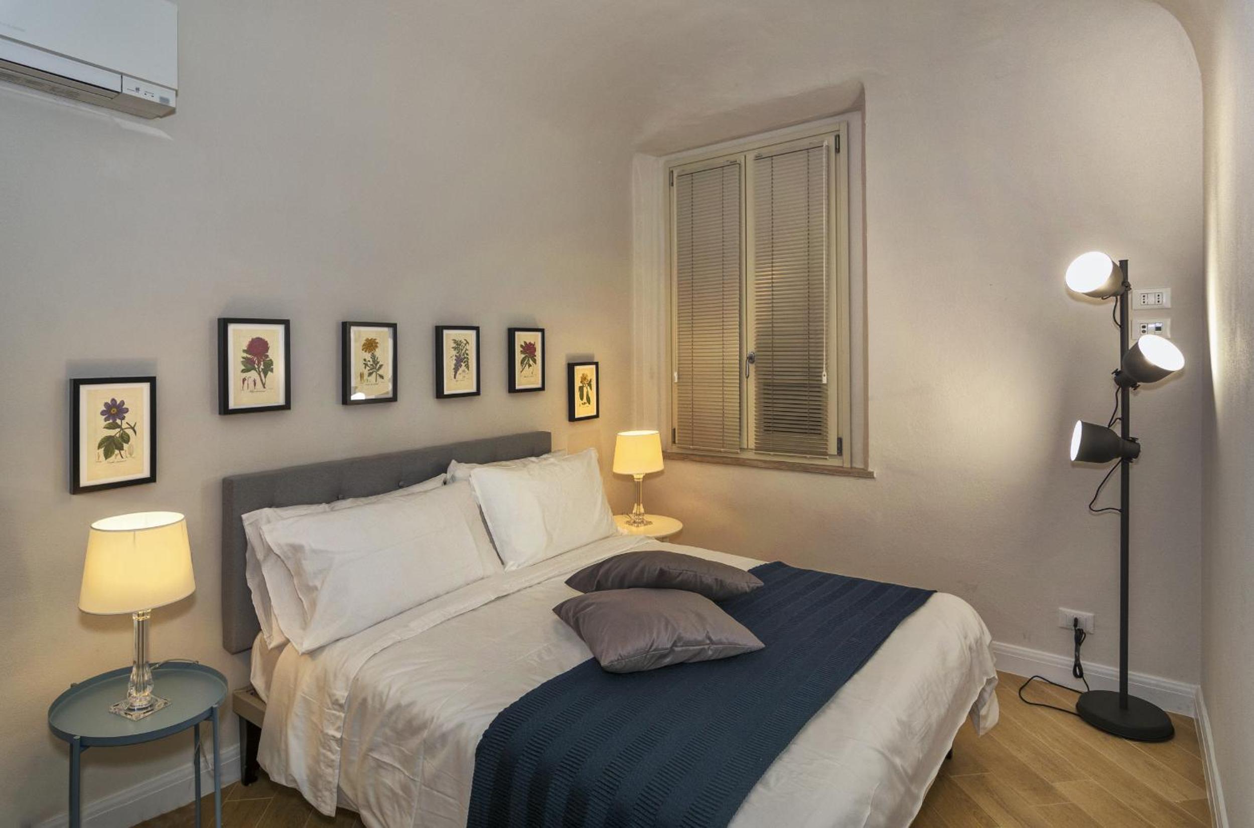 Quadruple Room with Balcony - Photo 1