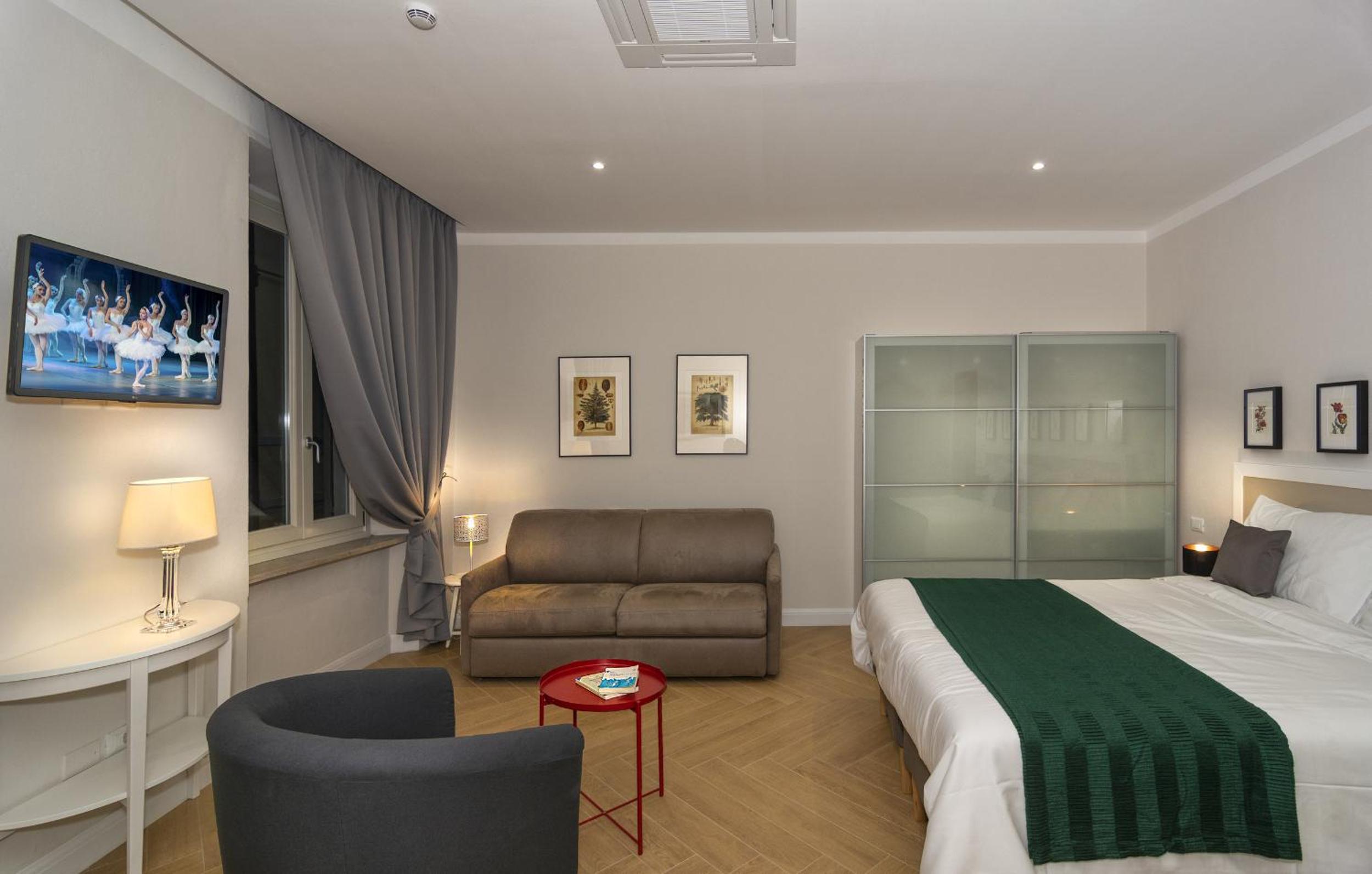 Deluxe Triple Room - Photo 12
