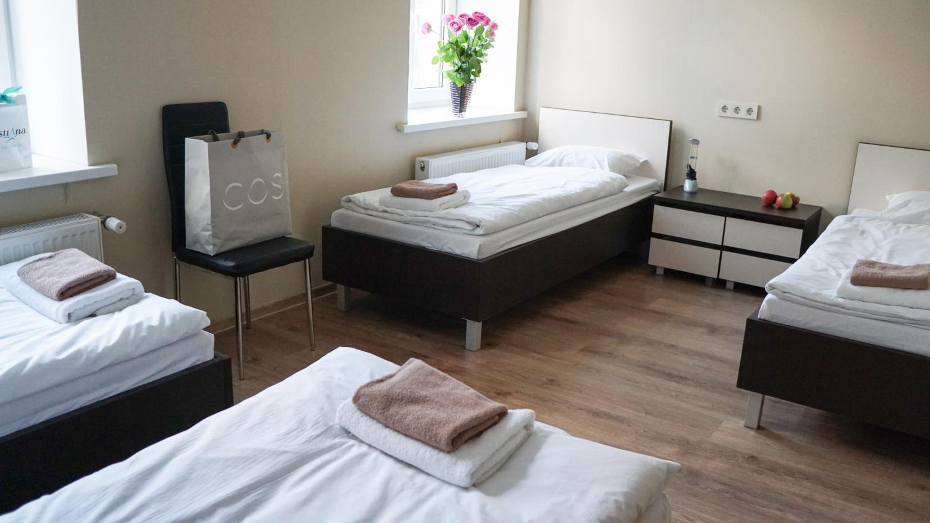 Quadruple Room with four single beds photo 2