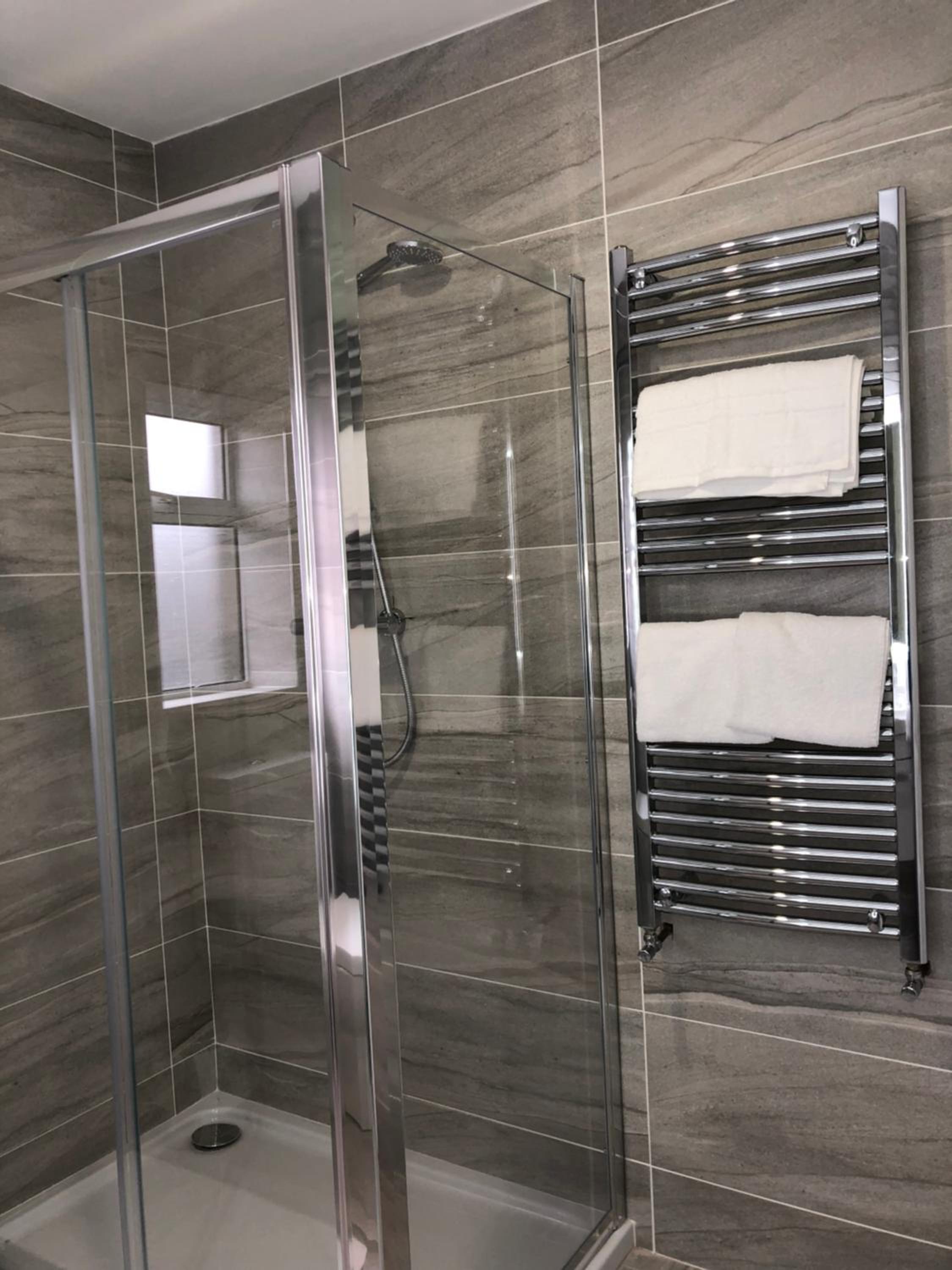 Basic Triple Room with Shared Bathroom photo 2
