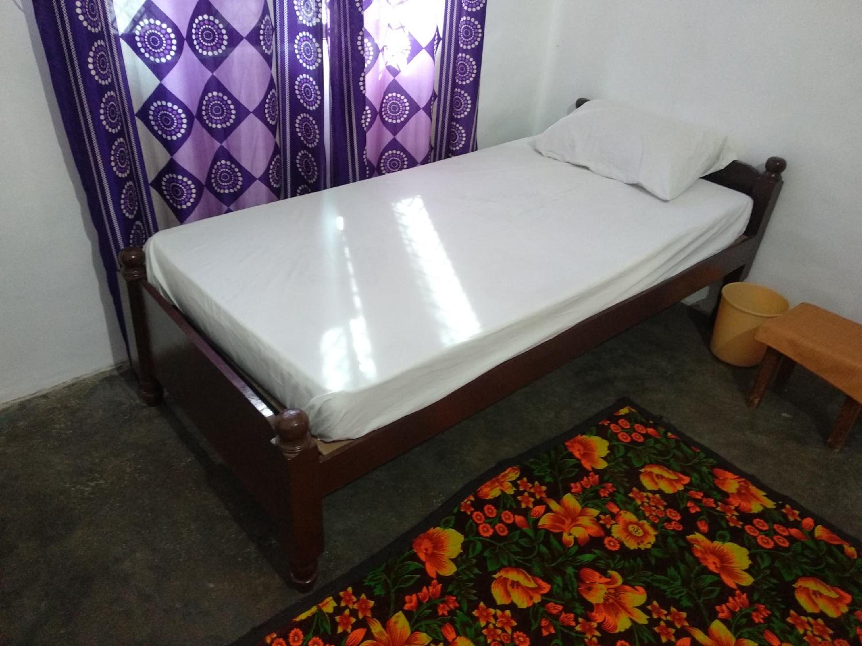 Single Bed In Female Dormitory Room photo 1