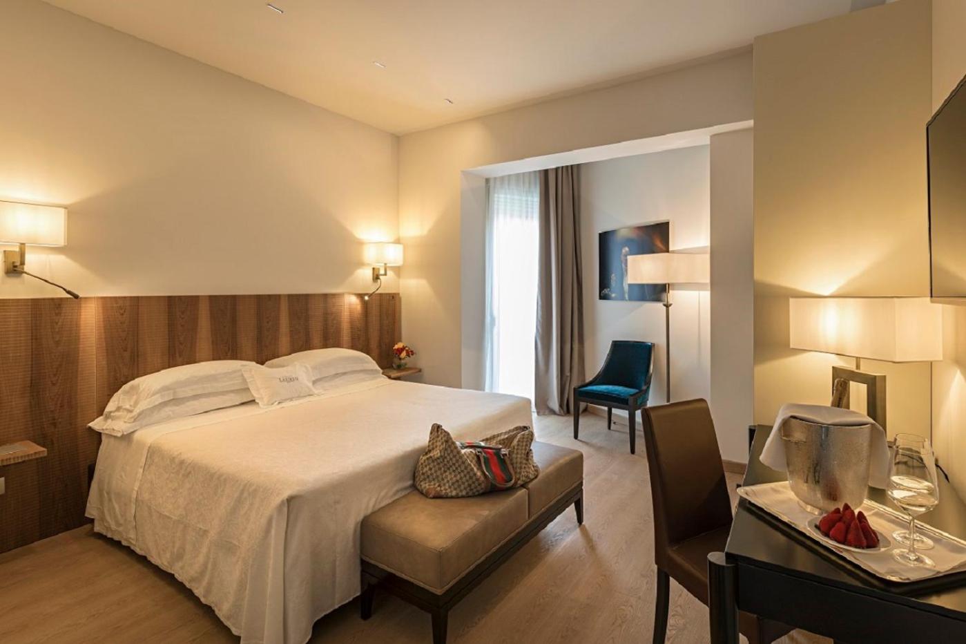 Superior Double Room with Partial Lake View and Small Balcony