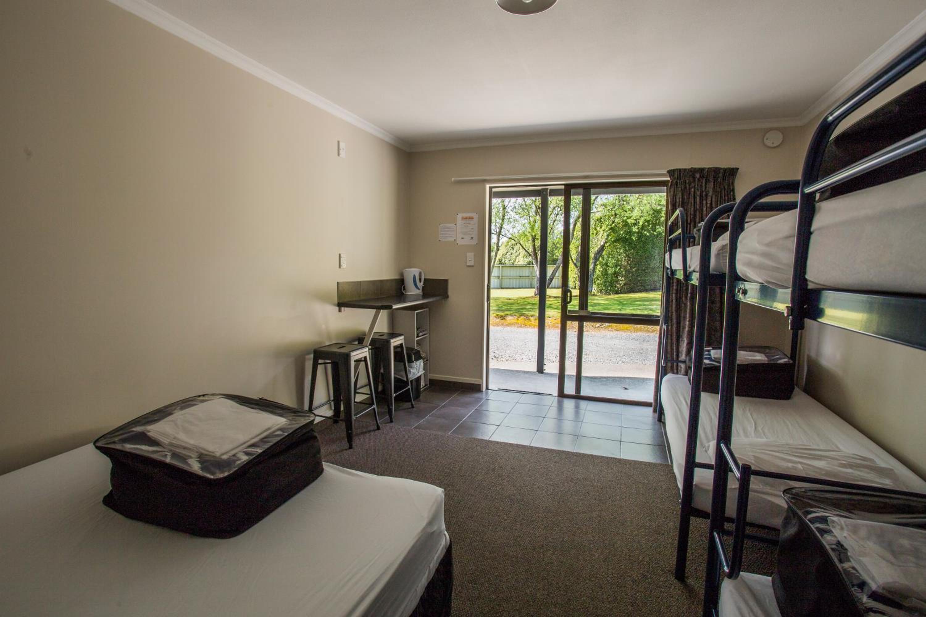 Large Standard Cabin with Shared Bathroom - 1 Queen and 4 Bunk Beds