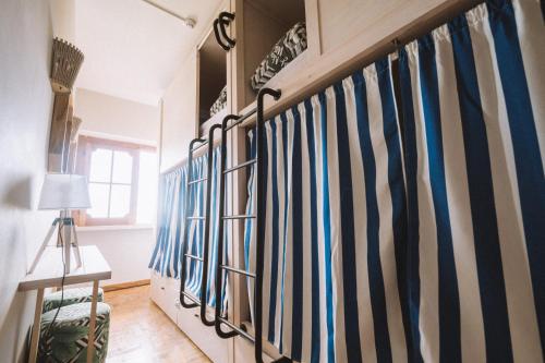 Bed in 4-Bed Mixed Dormitory Room with En Suite Shared Bathroom photo 1