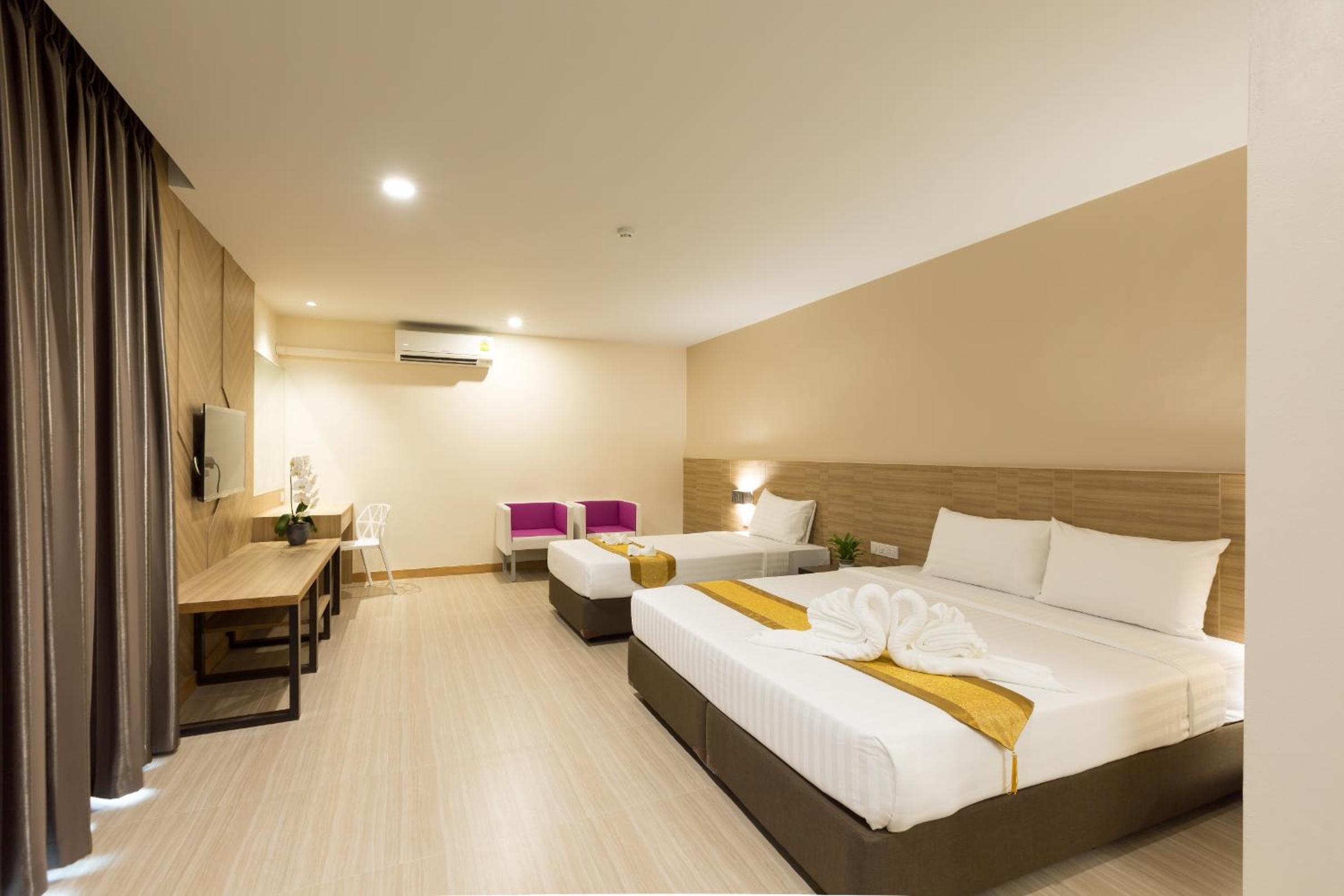 Deluxe Triple Room - Photo 1