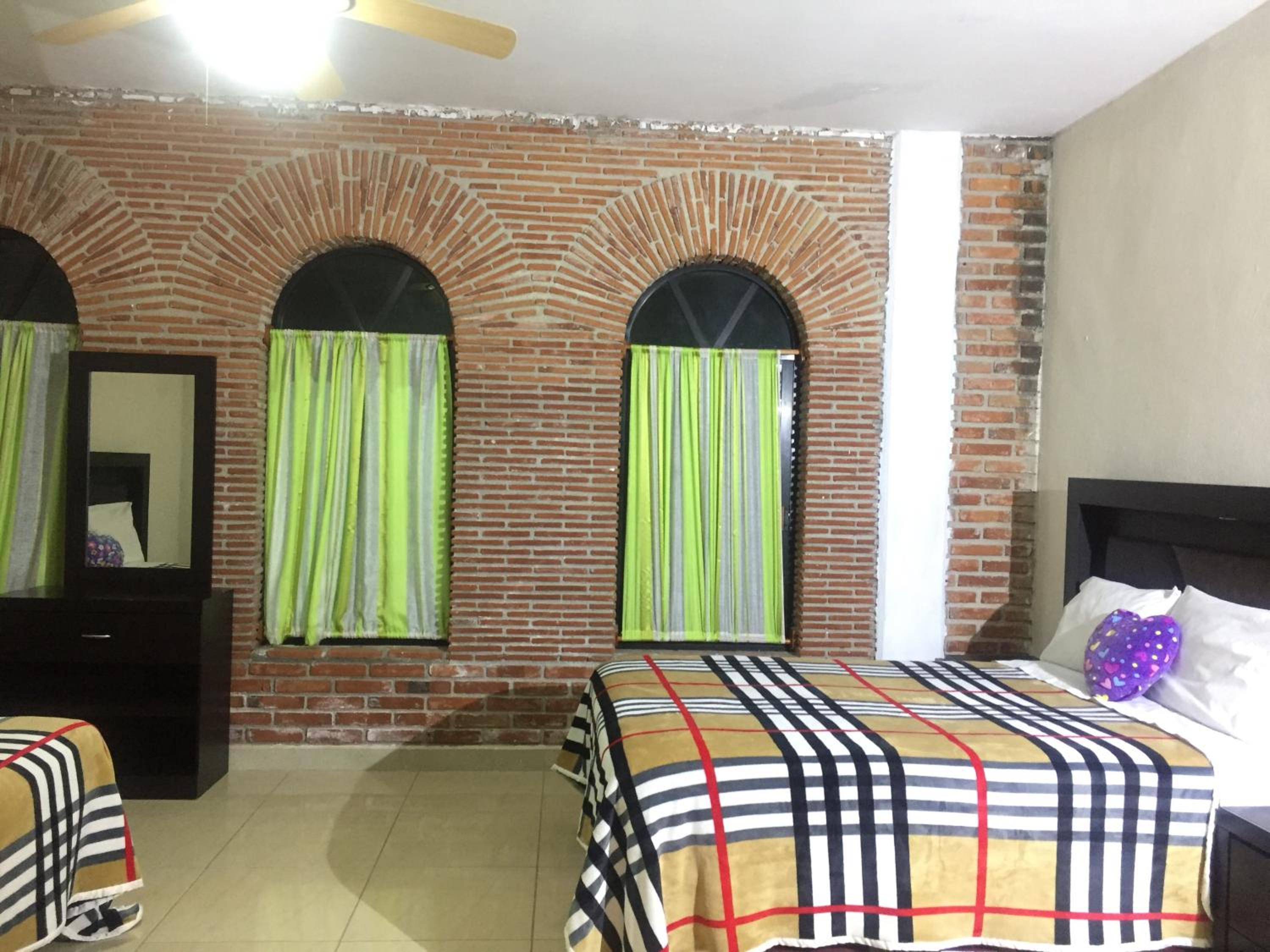 Quadruple Room with Garden View - Photo 17